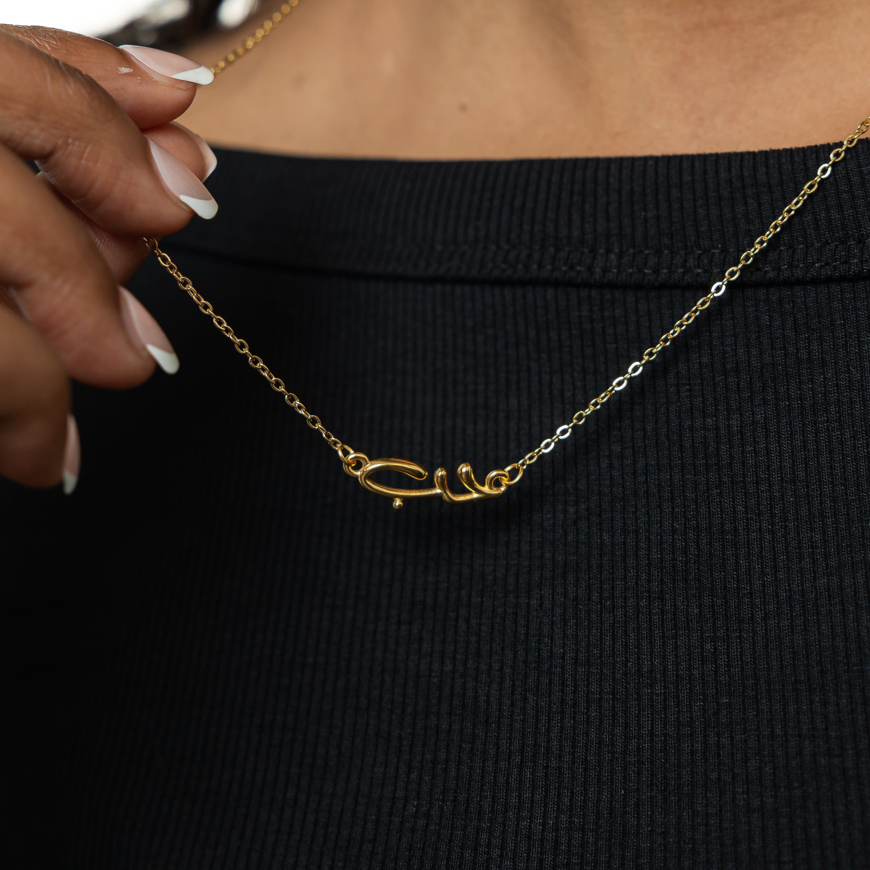 Model wearing the bubble necklace with a casual outfit, highlighting its versatility.