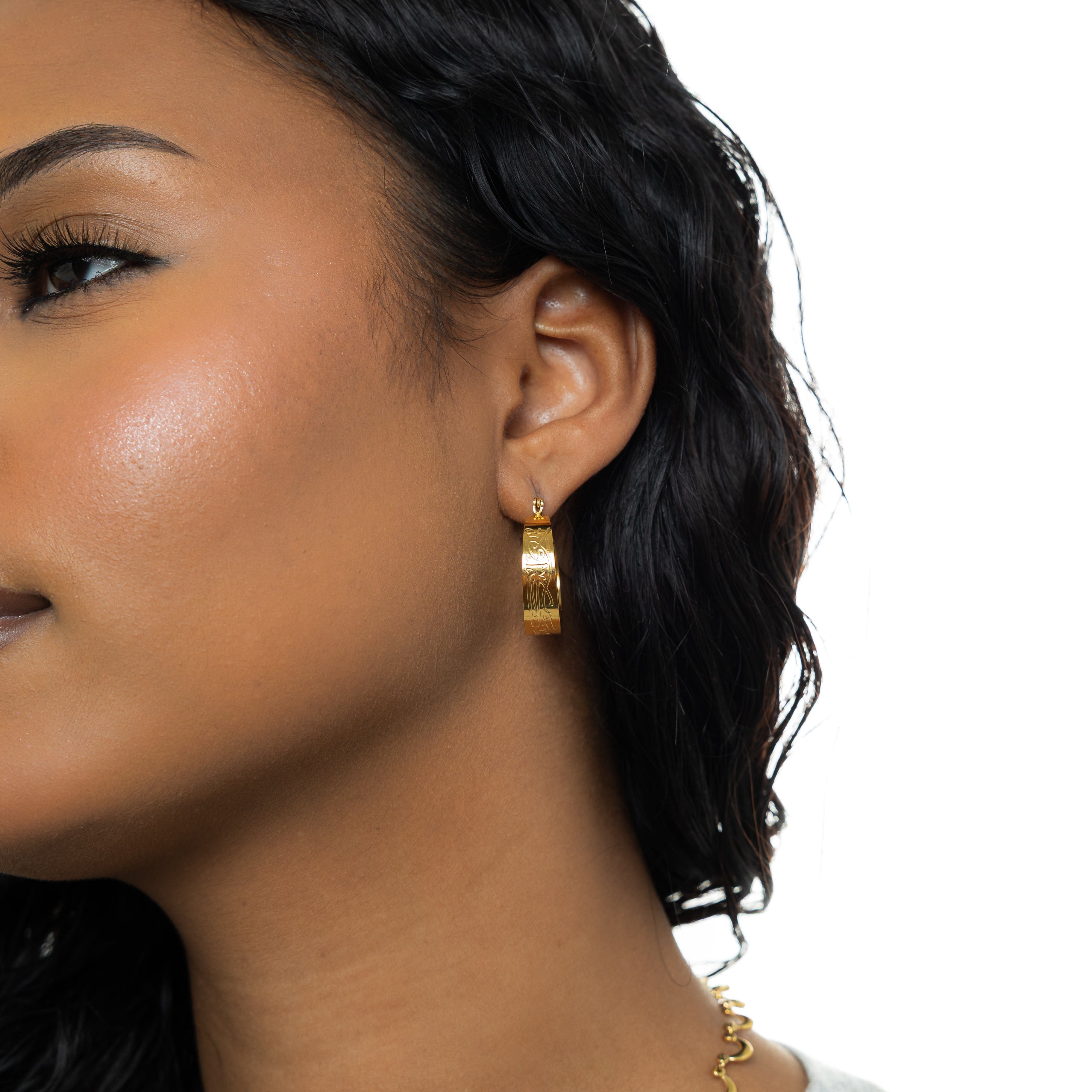 Close-up of Self-Love Hoop Earrings showcasing the Arabic inscription.