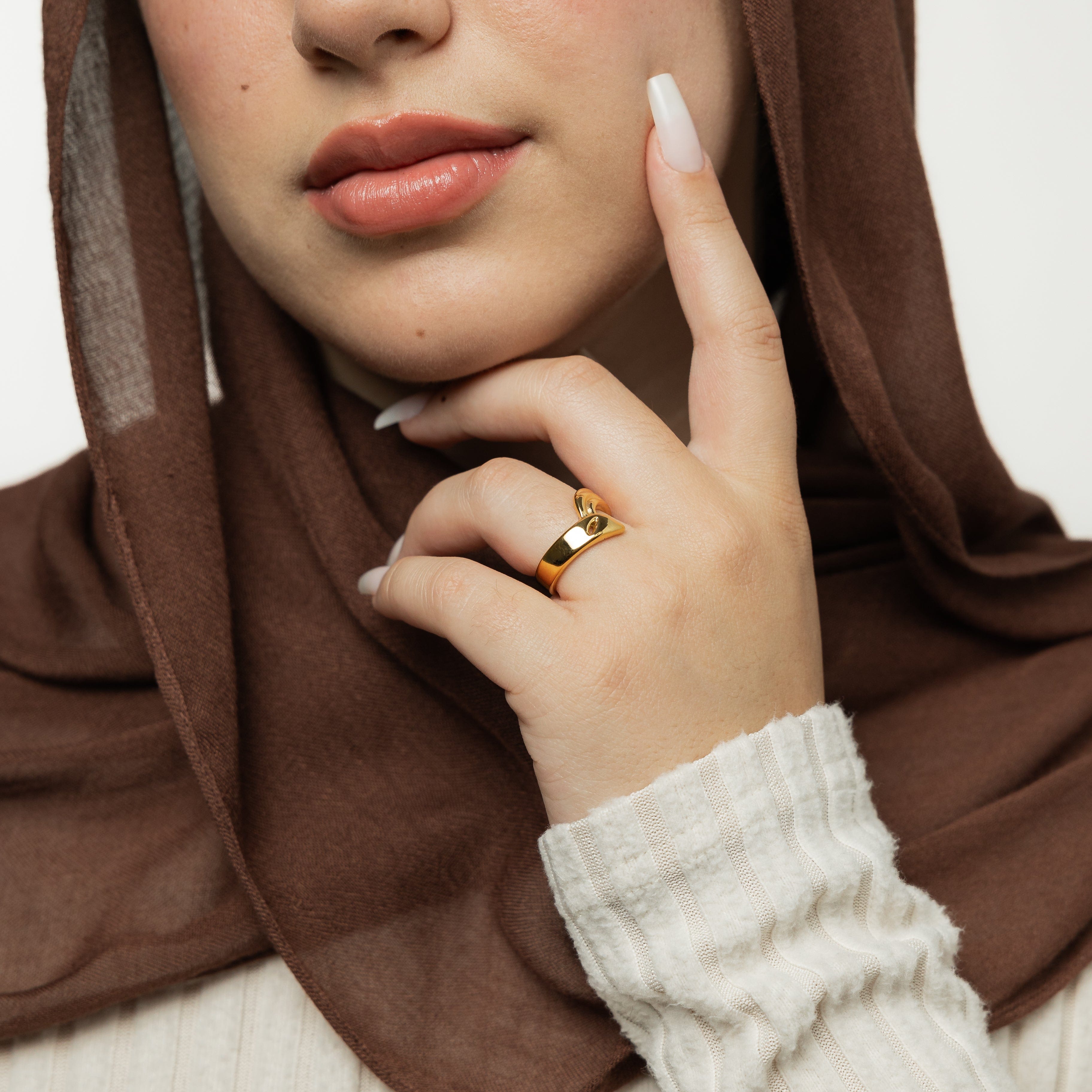 Eternal Heart Love Ring displayed on a hand, emphasizing its elegant design.