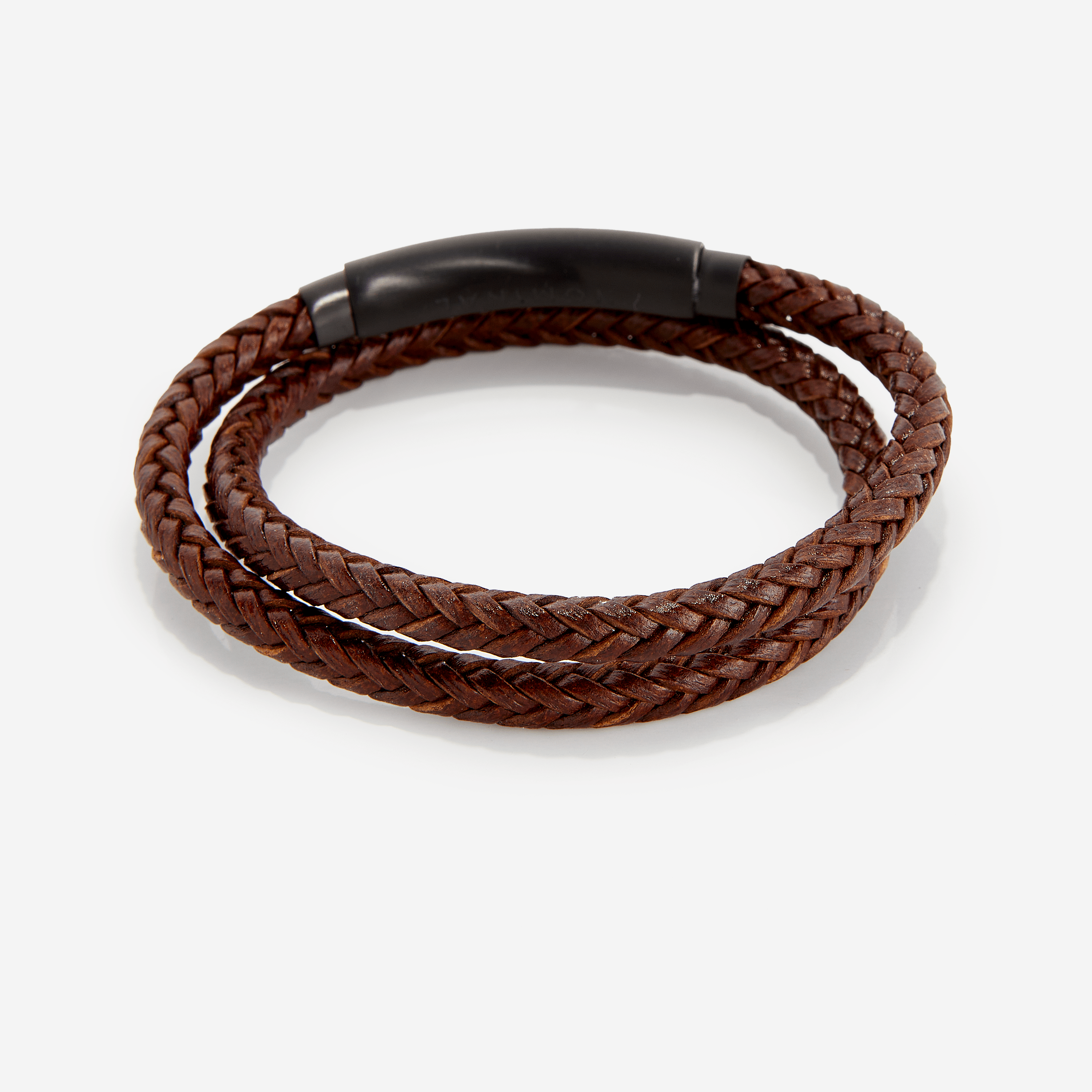 Eternal faux leather bracelet displayed on a wooden surface, highlighting its unique spiral design.