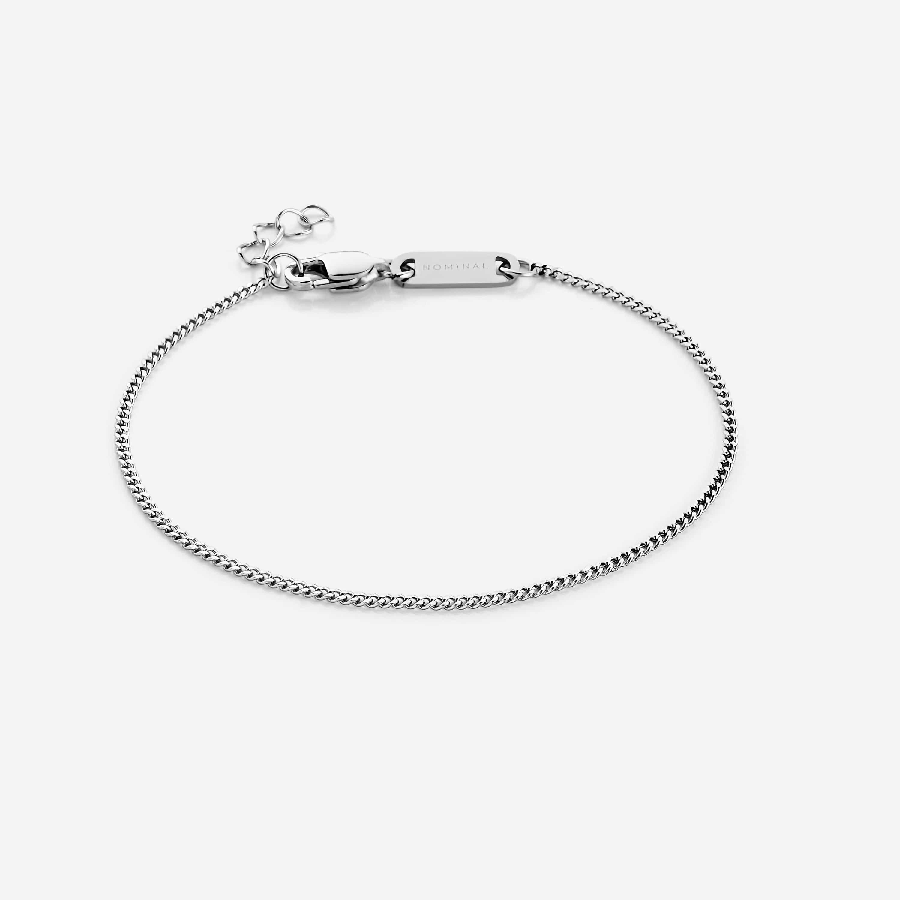 Close-up view of the Timeless Micro Chain Bracelet showcasing its flat oval pattern.