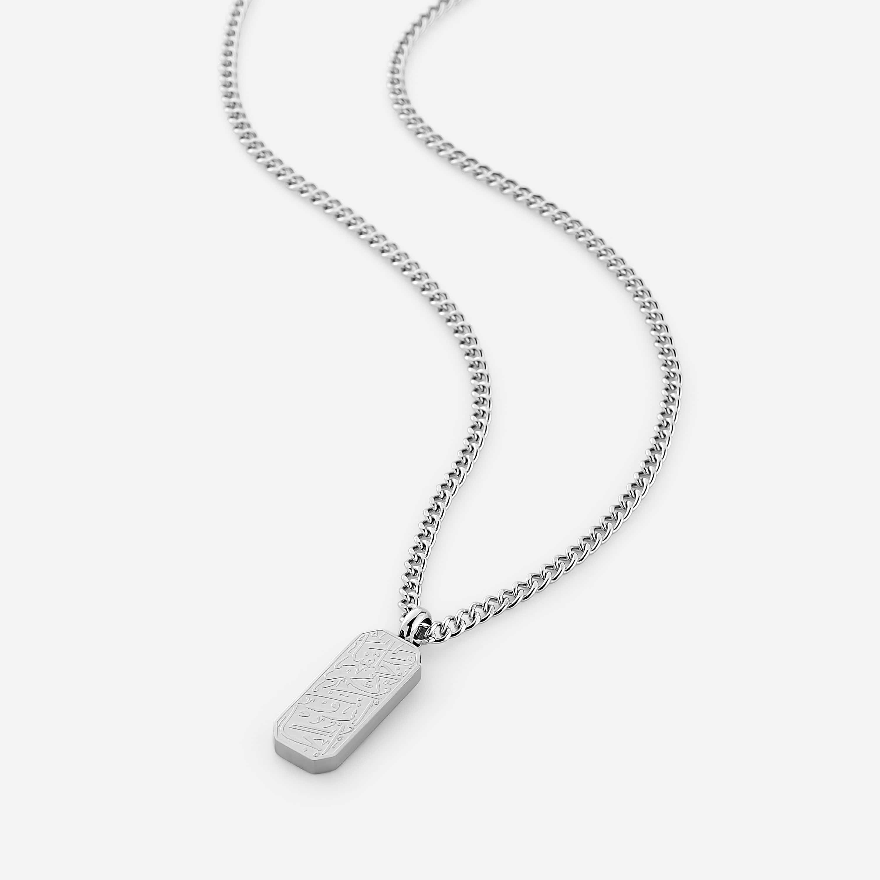 Close-up view of the Pairs of Love engraved necklace for men, showcasing Arabic engraving.