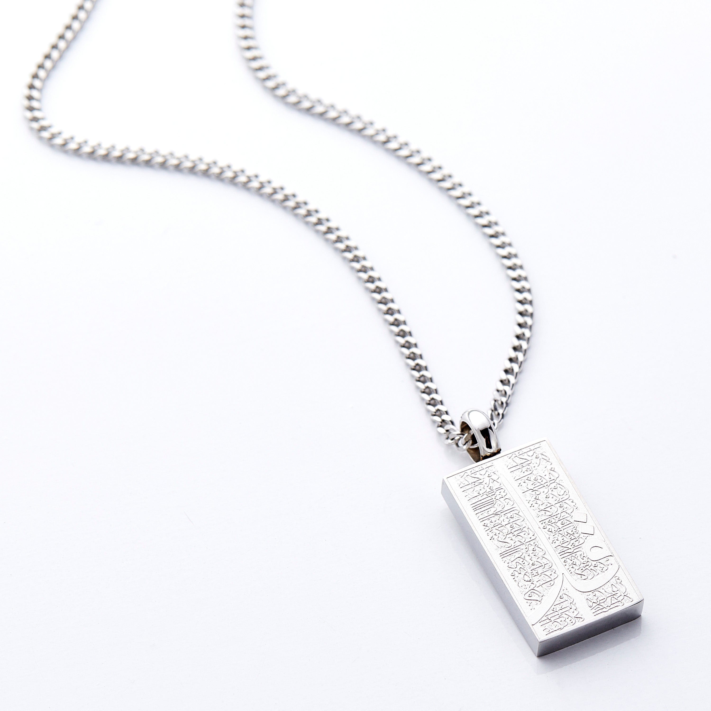 Close-up of the Four Qul calligraphy necklace showcasing its intricate design and craftsmanship.