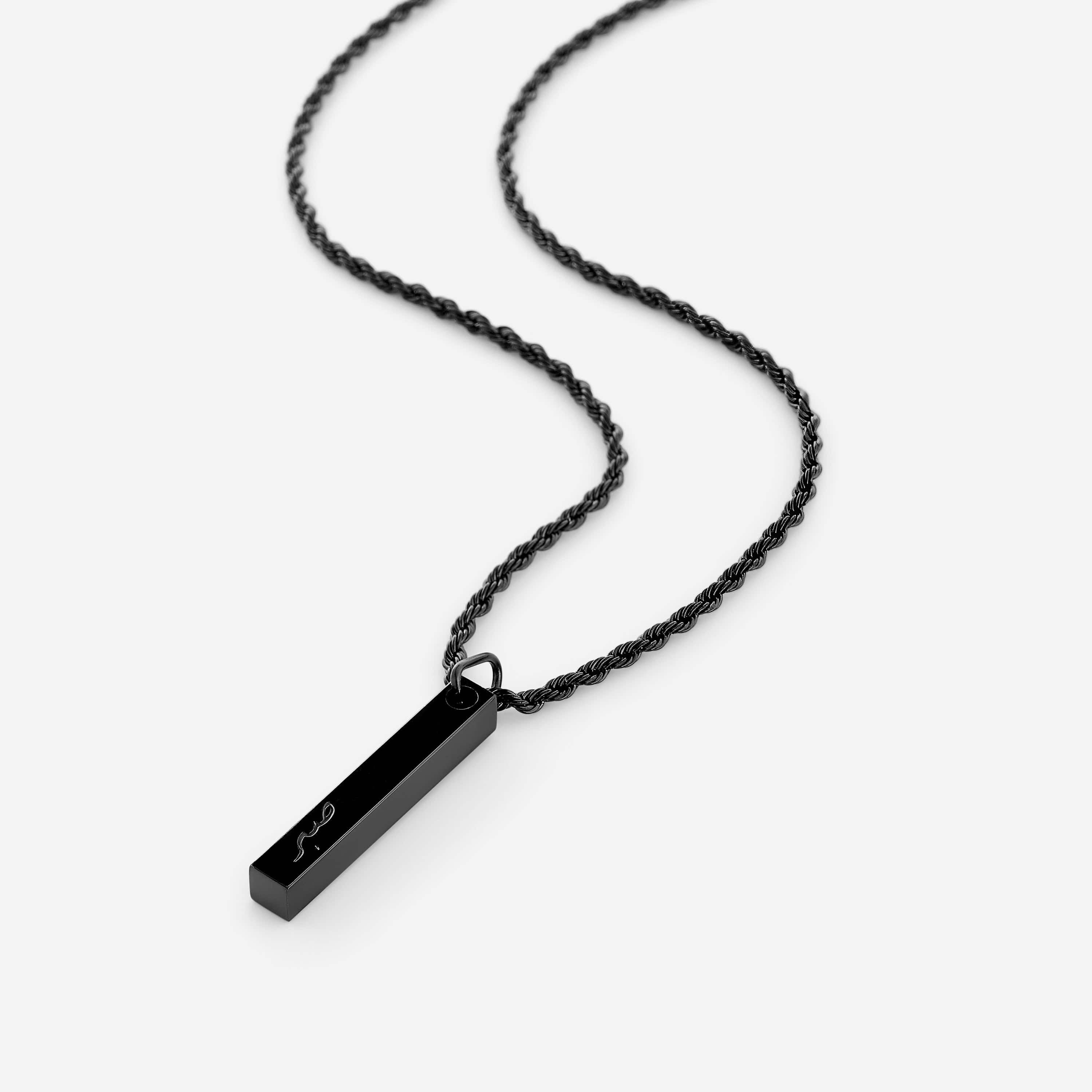 Mens necklace displayed with a stylish outfit, highlighting its versatility.