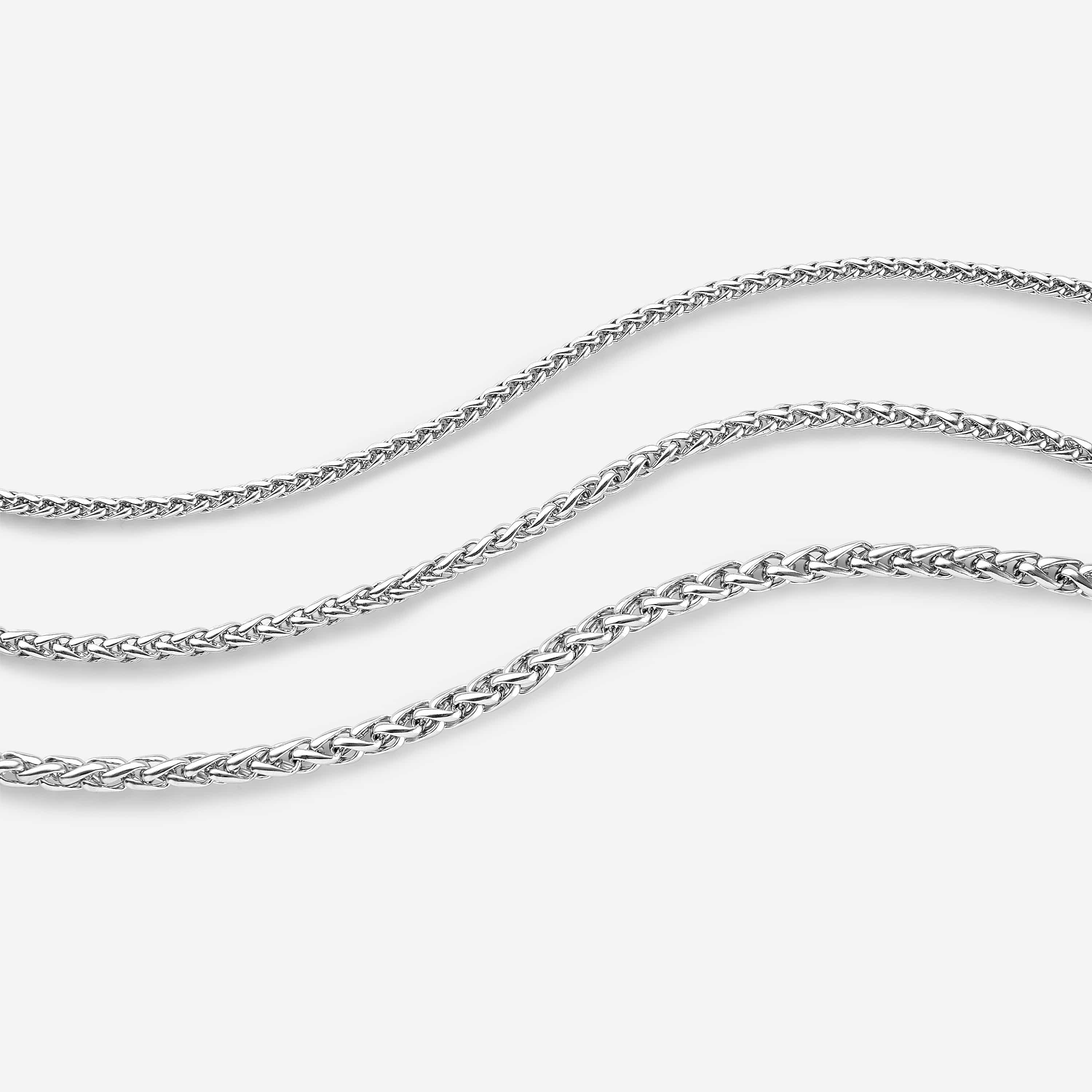 Close-up view of the bold wheat chain necklace showcasing its braided design.