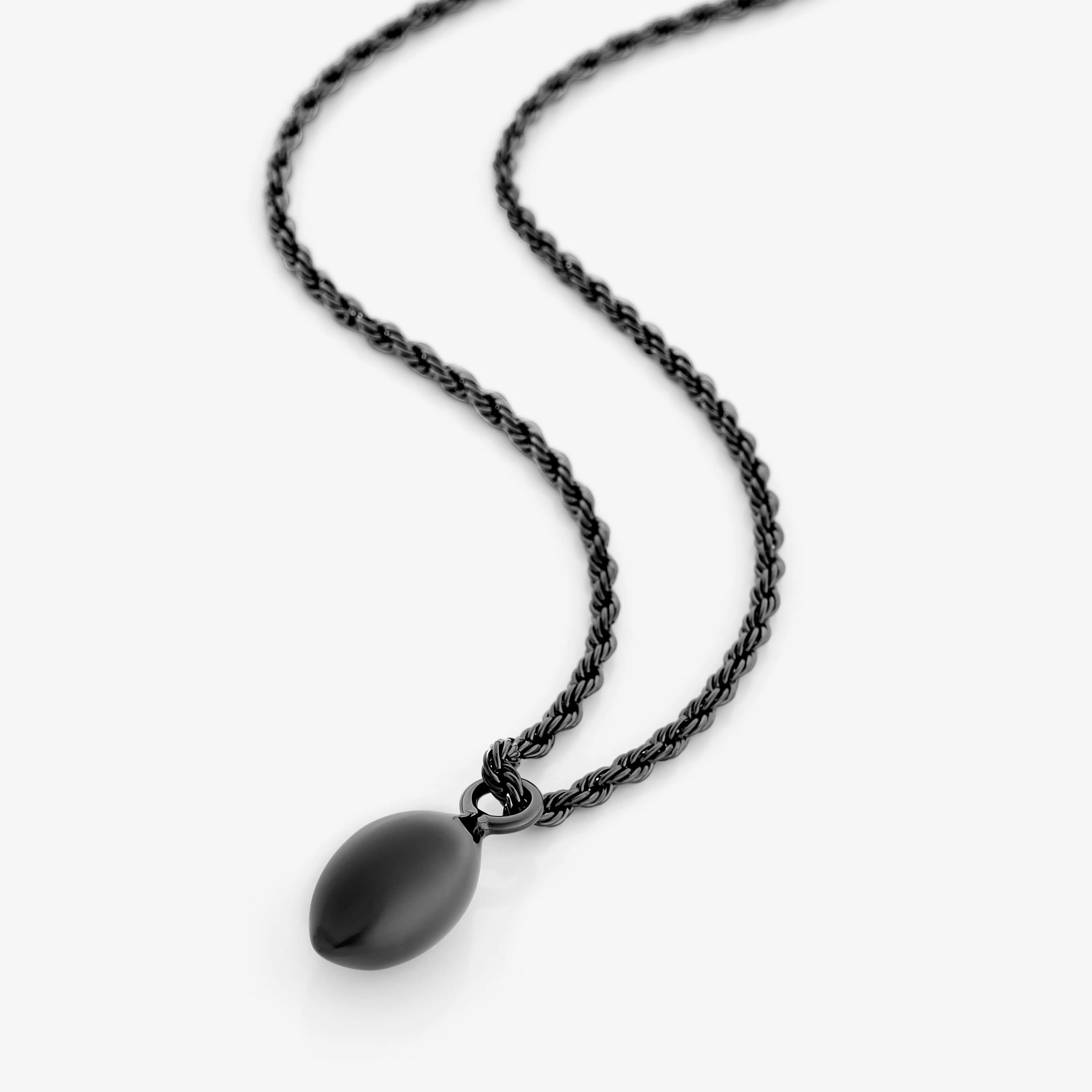 Necklace displayed in Nominal velvet pouch, perfect as the best resistance jewelry gift for him.
