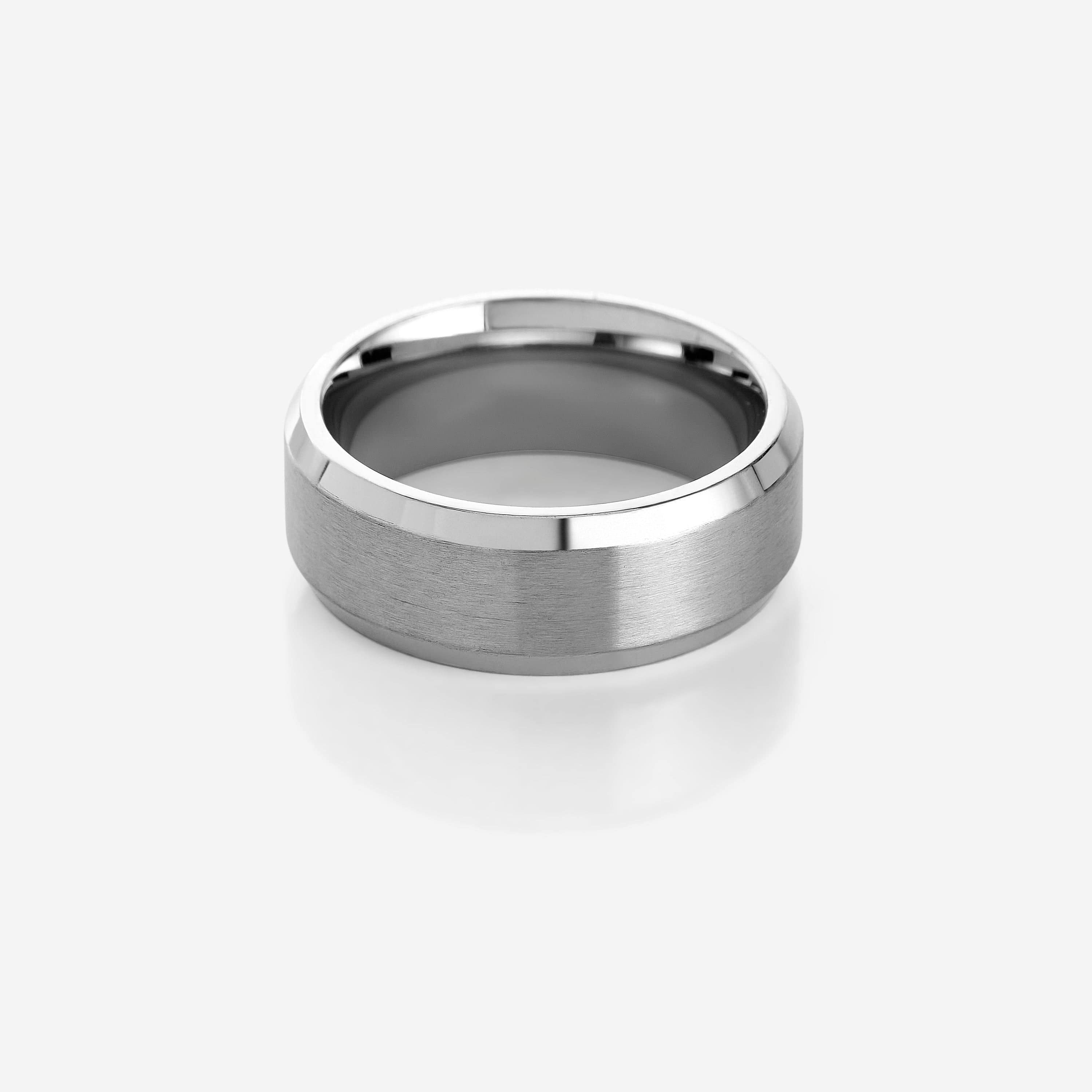 Close-up of brushed stainless steel band with polished edges, ideal for minimalist men's rings