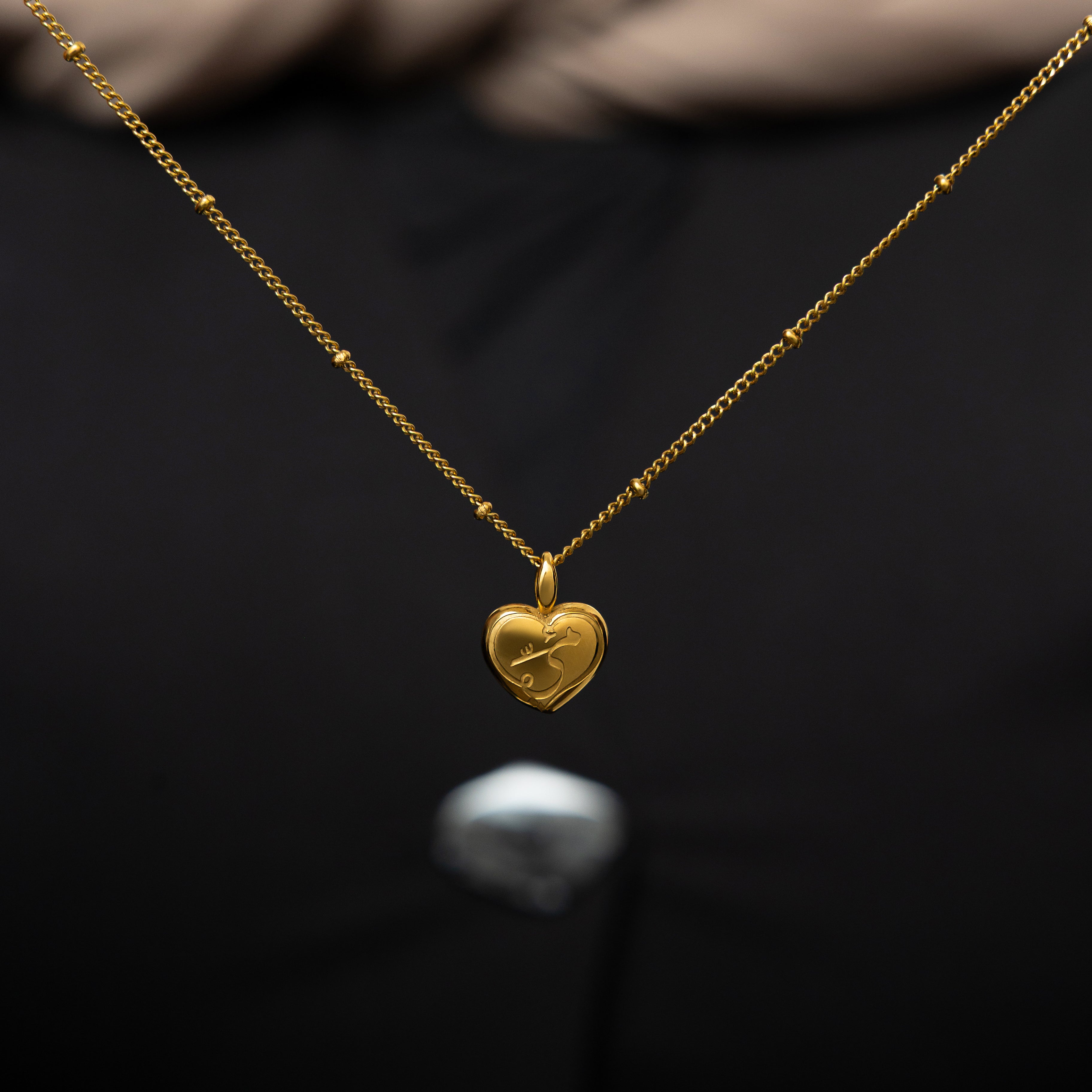 Mamas Heart Gold Charm in Nominal Velvet Pouch, perfect for gifting on special occasions.