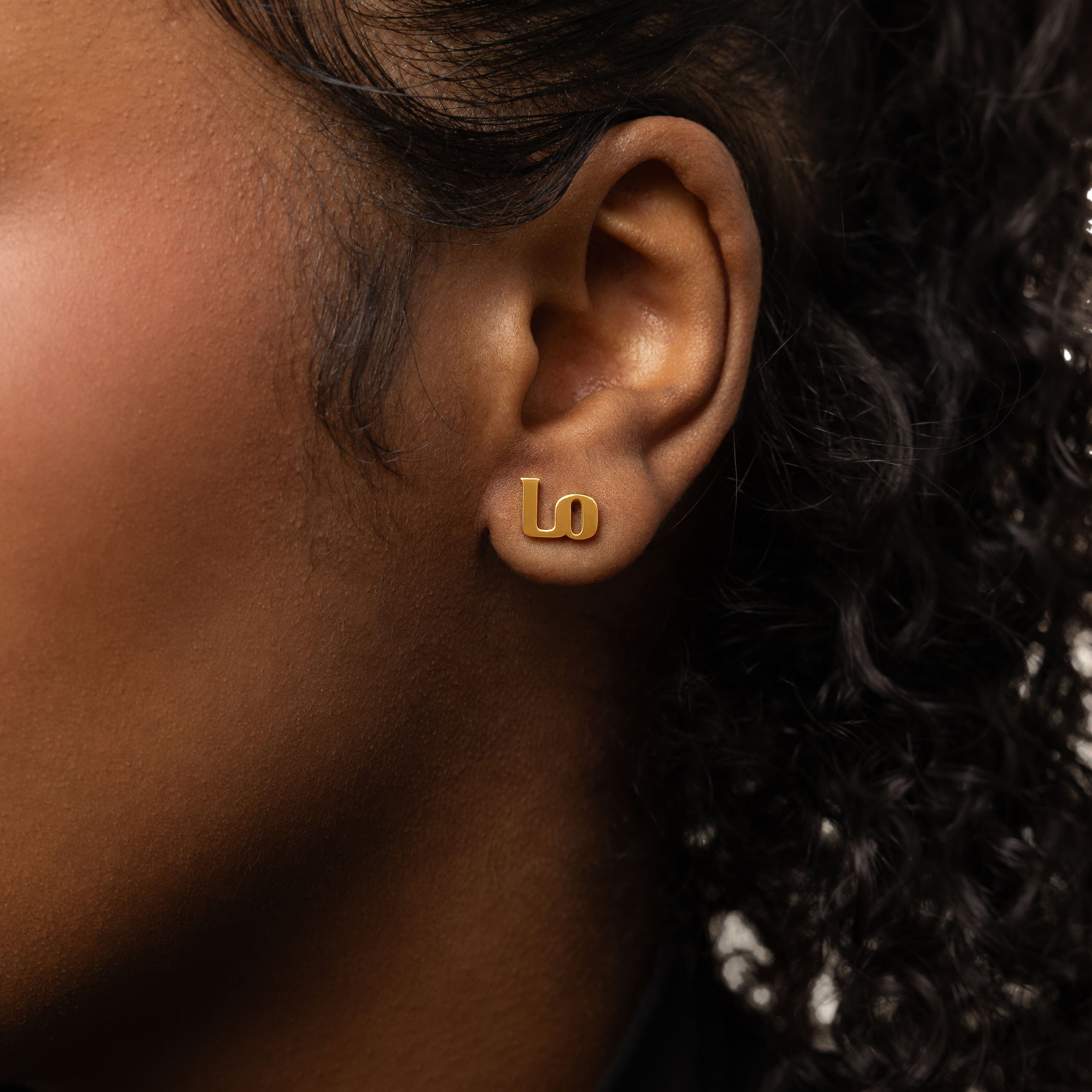 Mama Love earrings displayed in a velvet pouch, perfect for gifting.