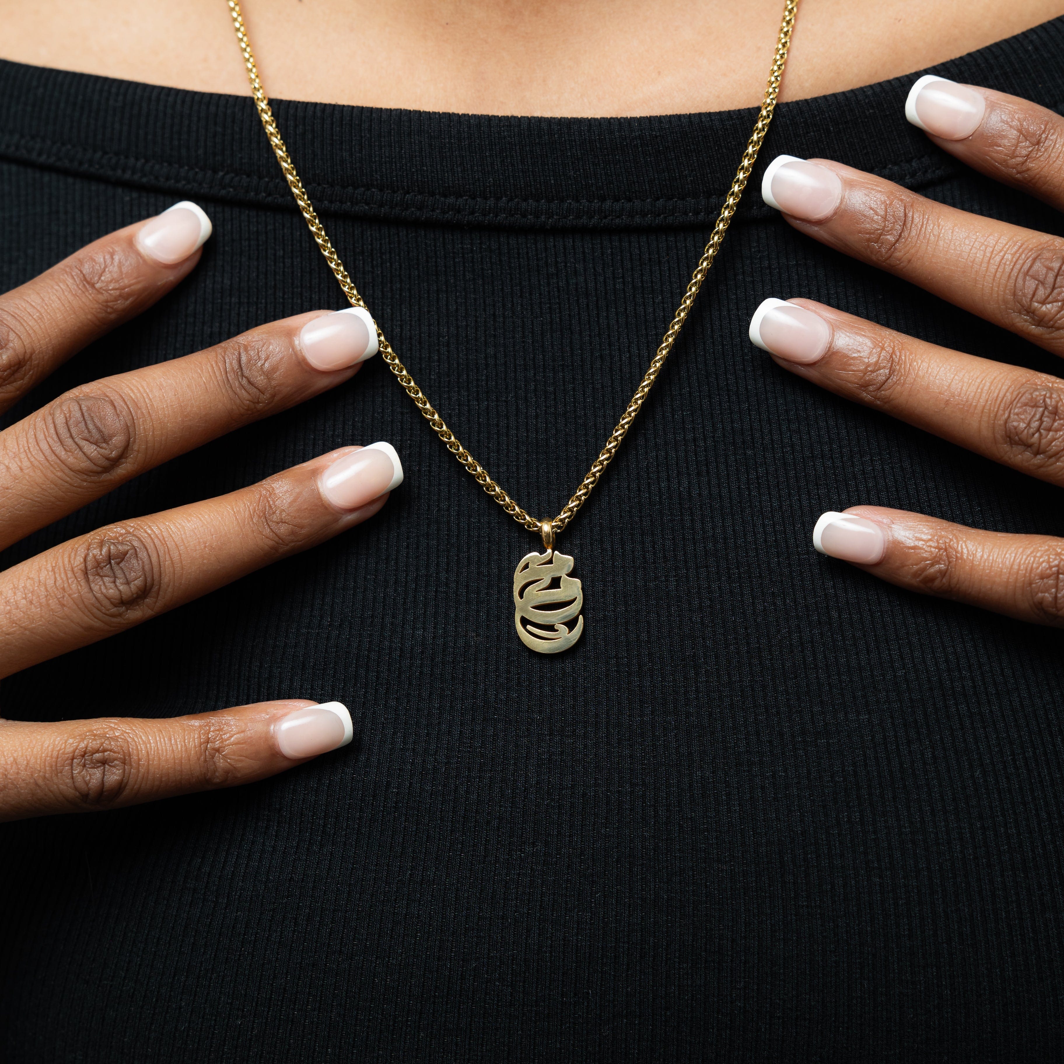 The Elegant Mama Necklace displayed on a velvet pouch, ready for gifting.
