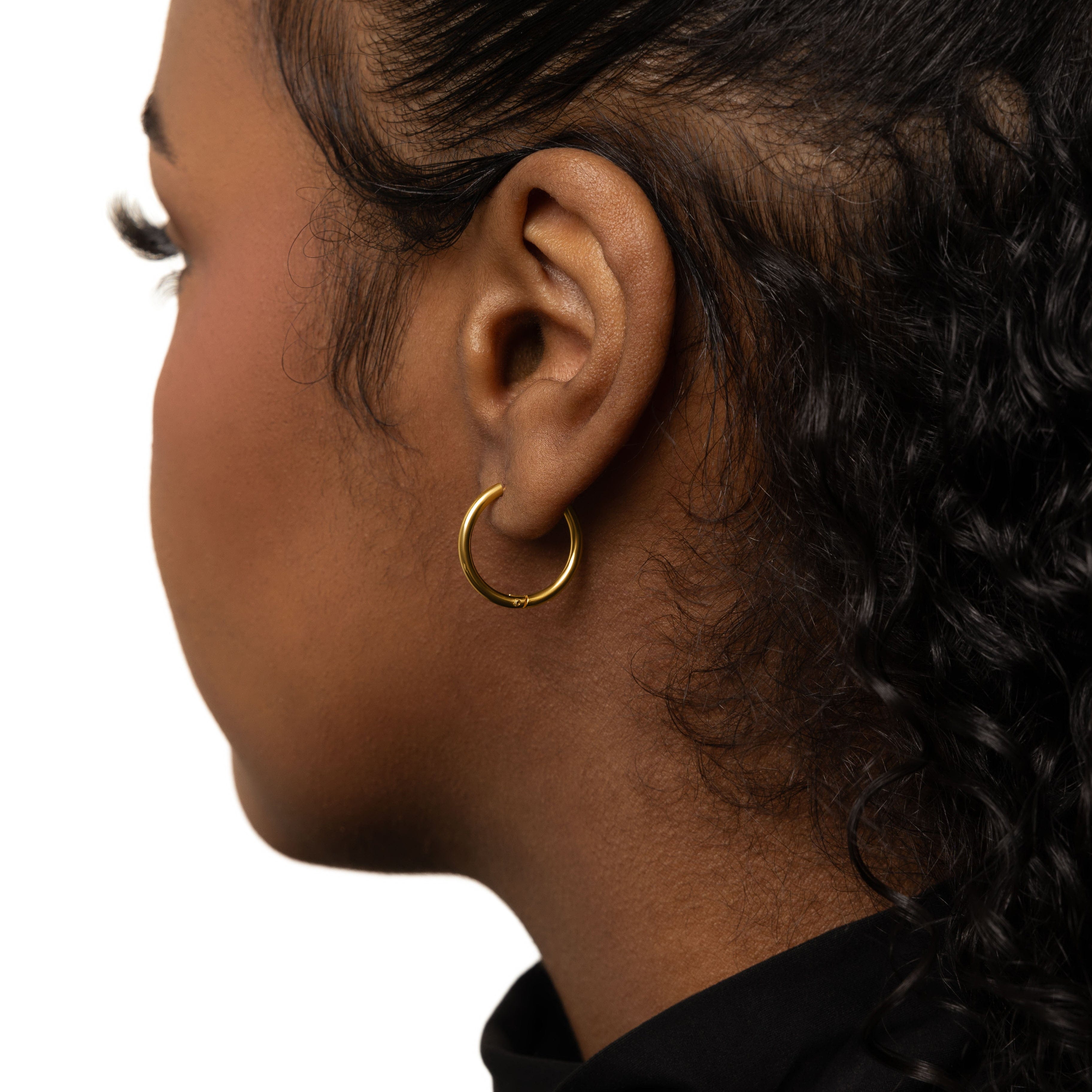 Side view of the 16mm hoops highlighting the lightweight structure and gold plating.