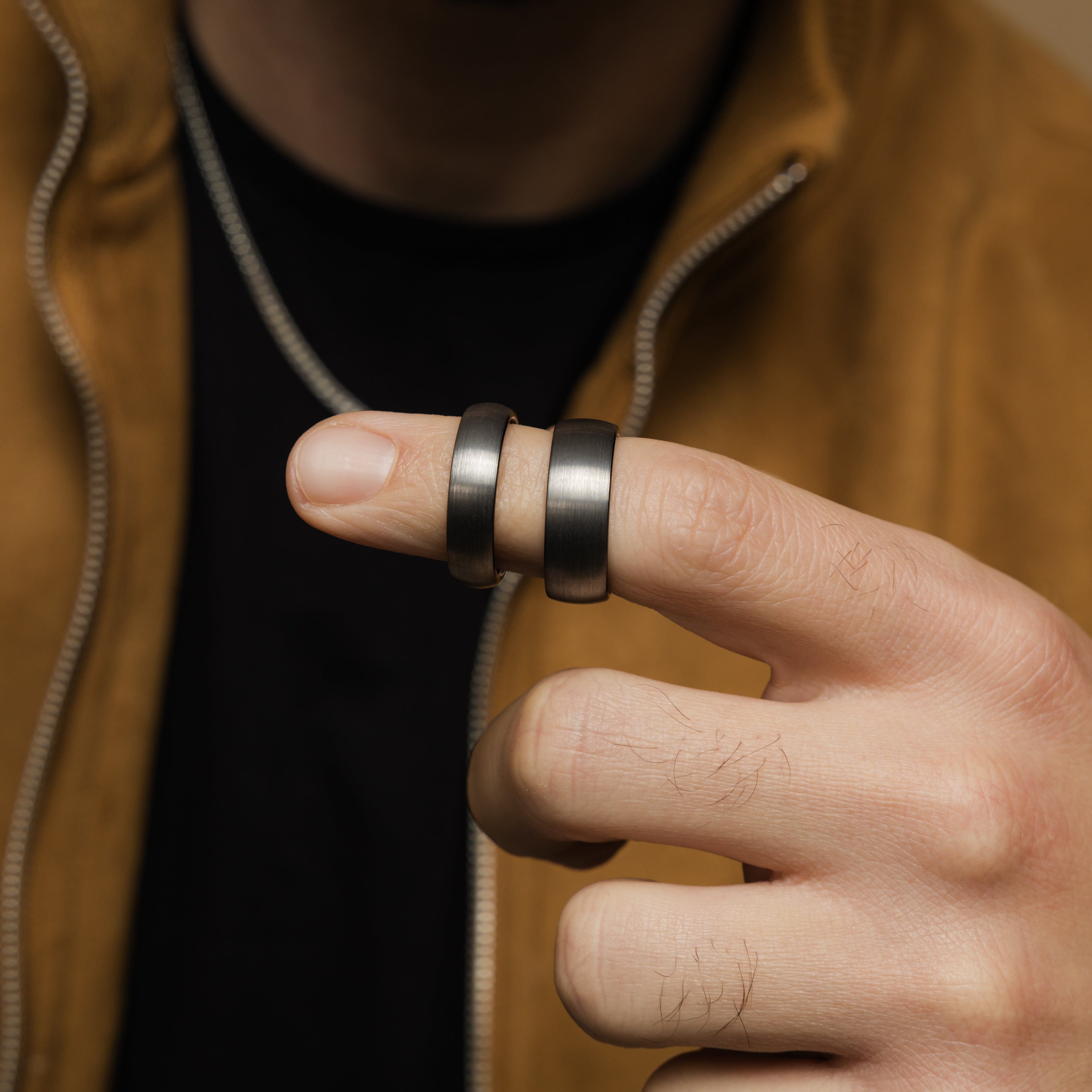 Close-up of the brushed tungsten band highlighting its smooth interior for comfort.