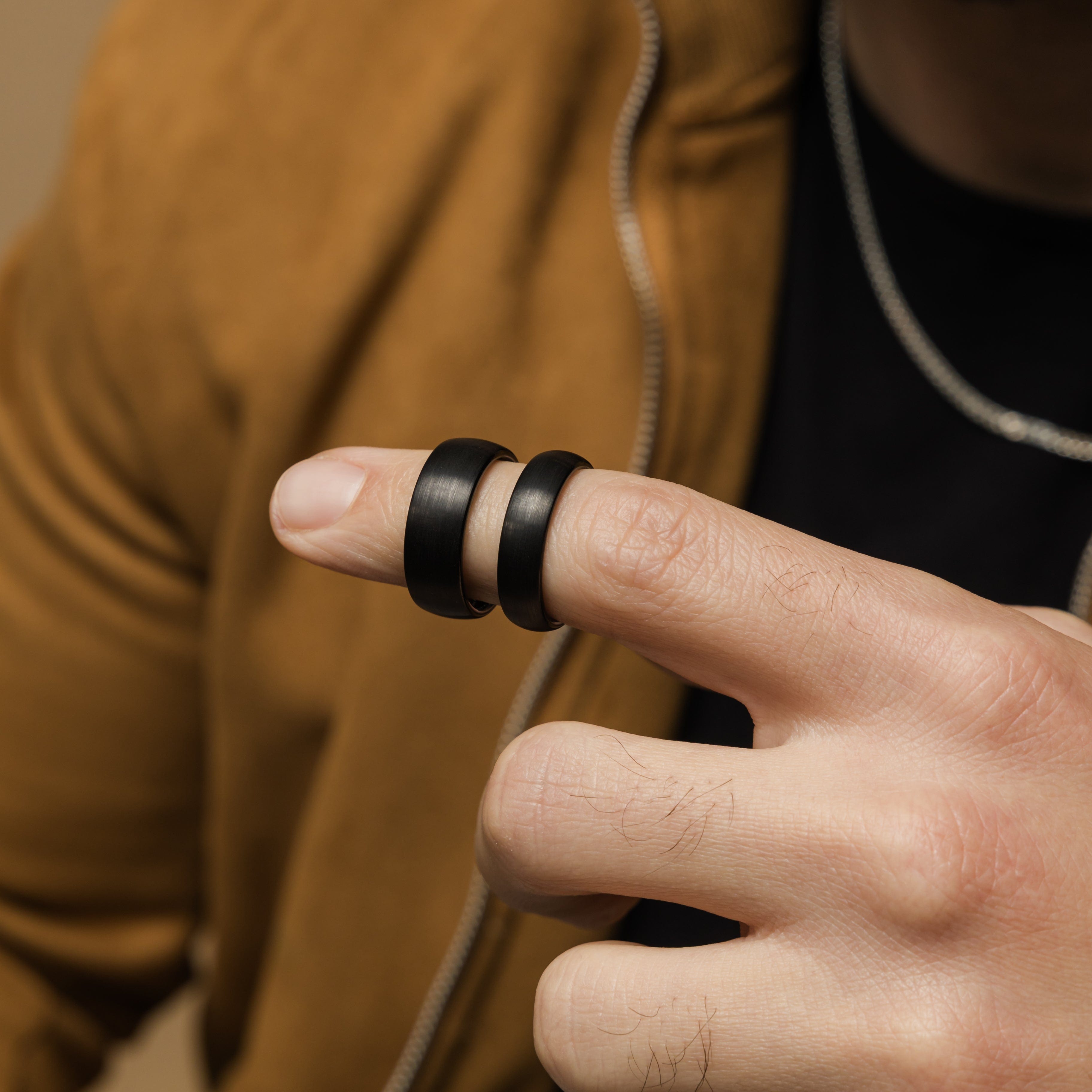 Brushed tungsten wedding band in silver, showcasing its elegant finish from a side angle.