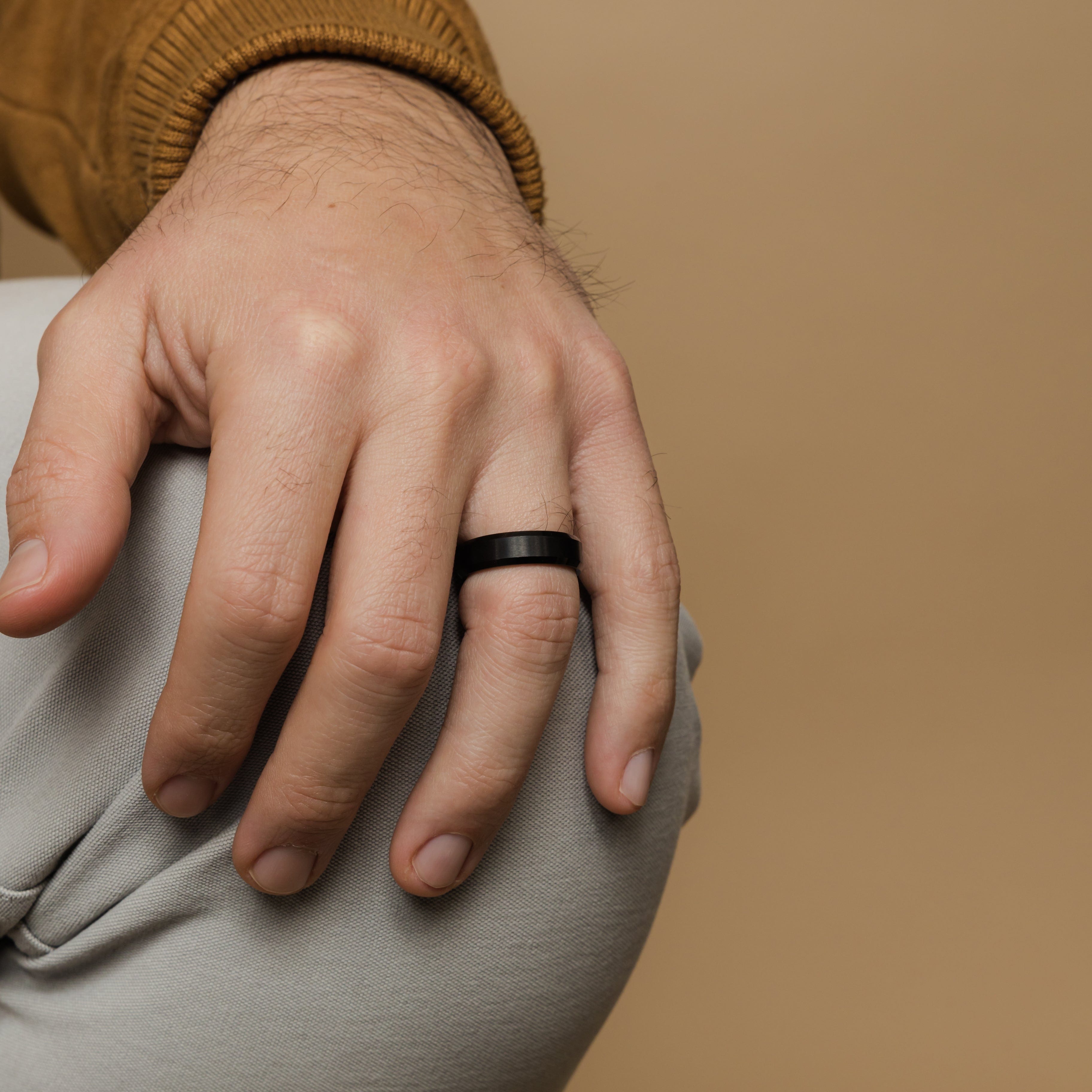 Close-up of Timeless Tungsten Mens Ring with brushed finish and glossy beveled edges.