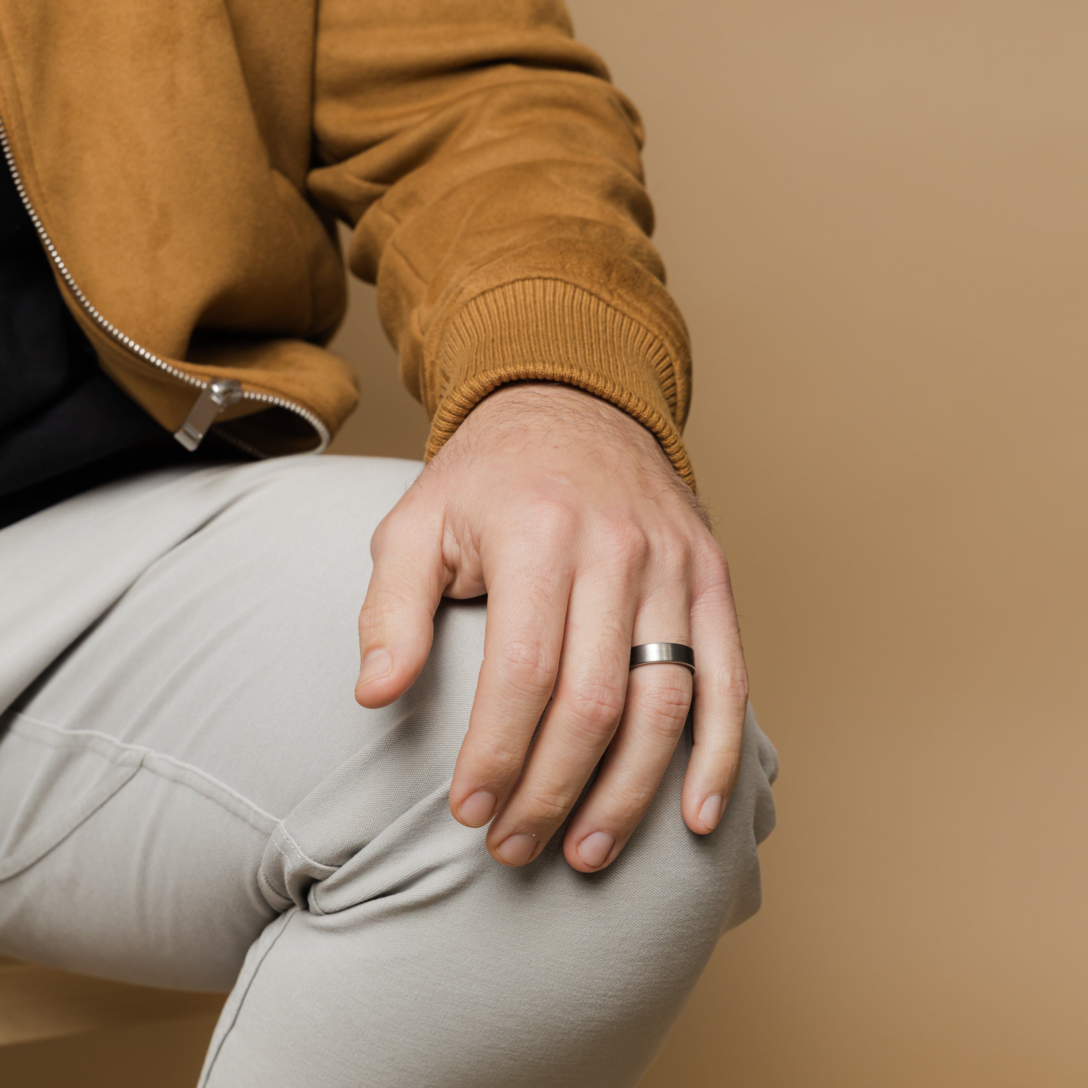 Close-up of the eternity flat tungsten ring showcasing its brushed finish.