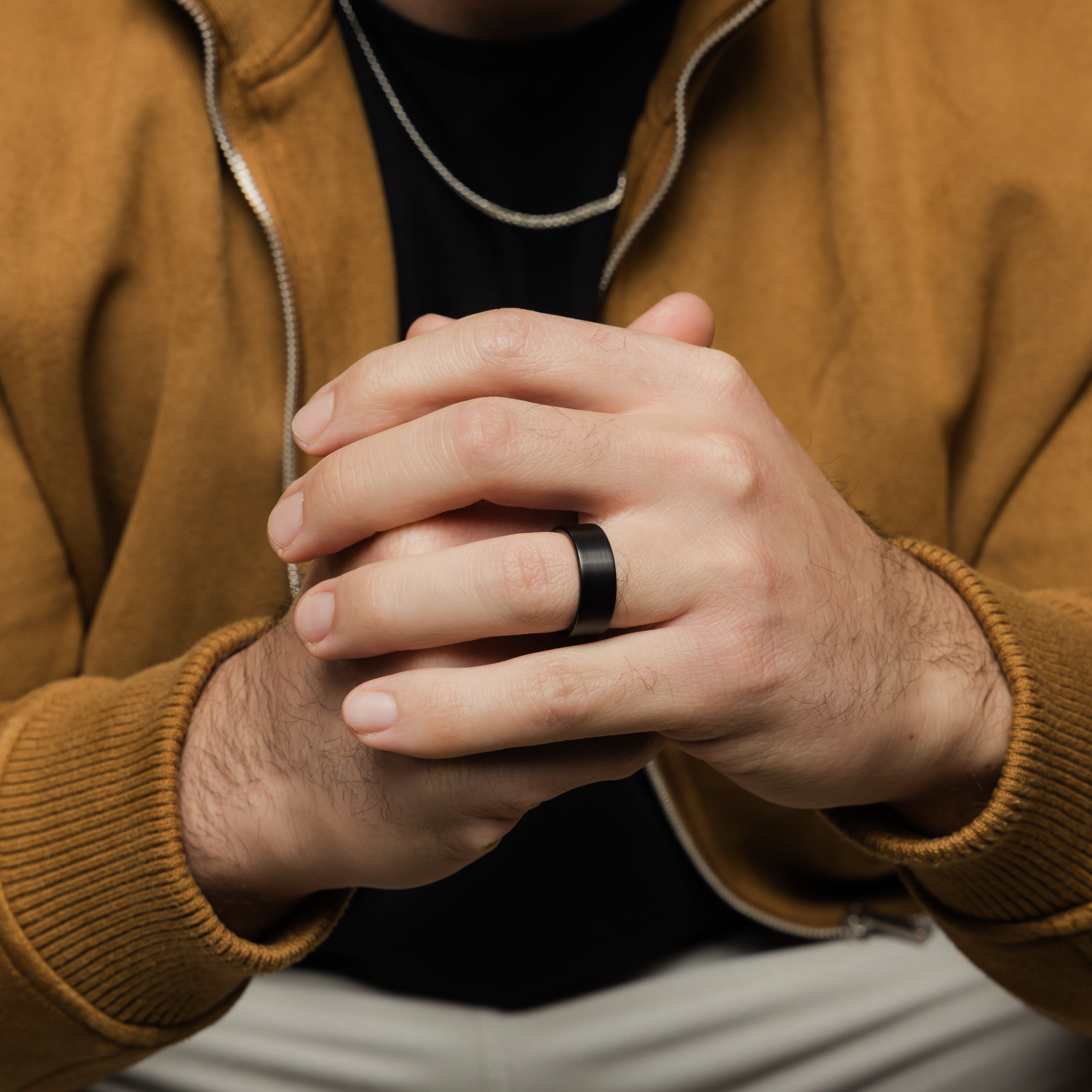 Close-up of the eternity flat tungsten ring showcasing its brushed finish.