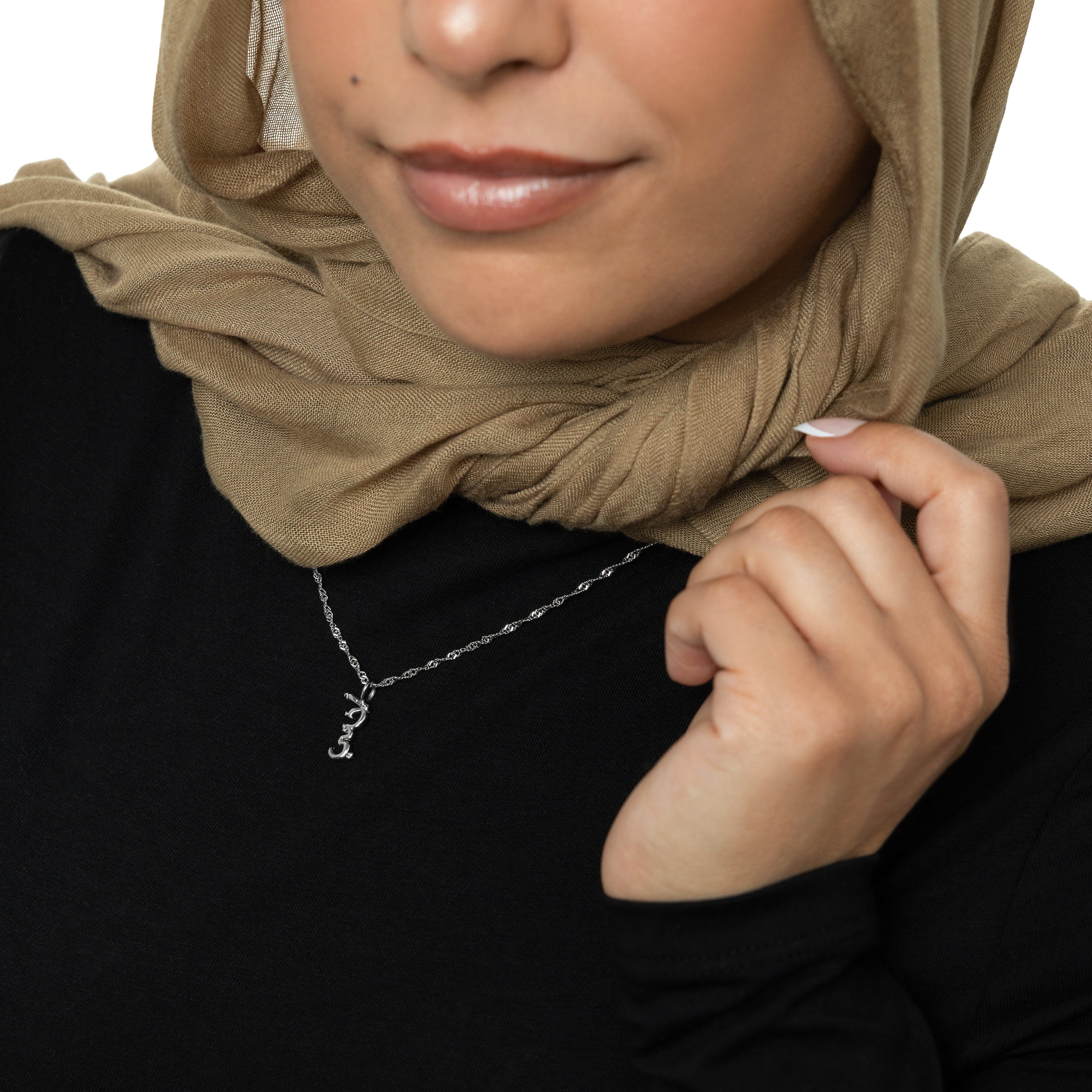 Sisterly Love Bubble Necklace showcasing the Arabic calligraphy pendant