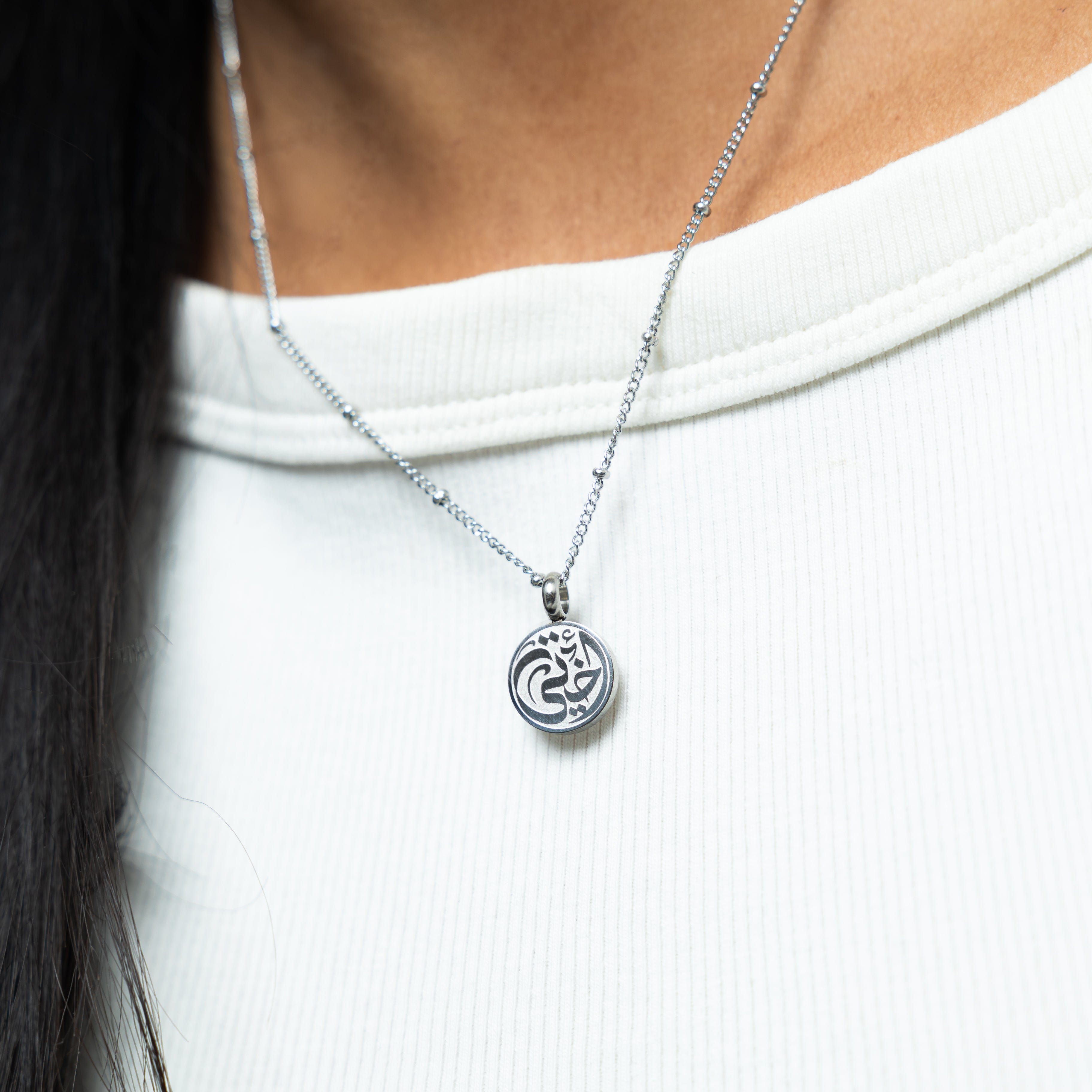 Model wearing the dainty necklace for women, showcasing pendant placement at full 22-inch length