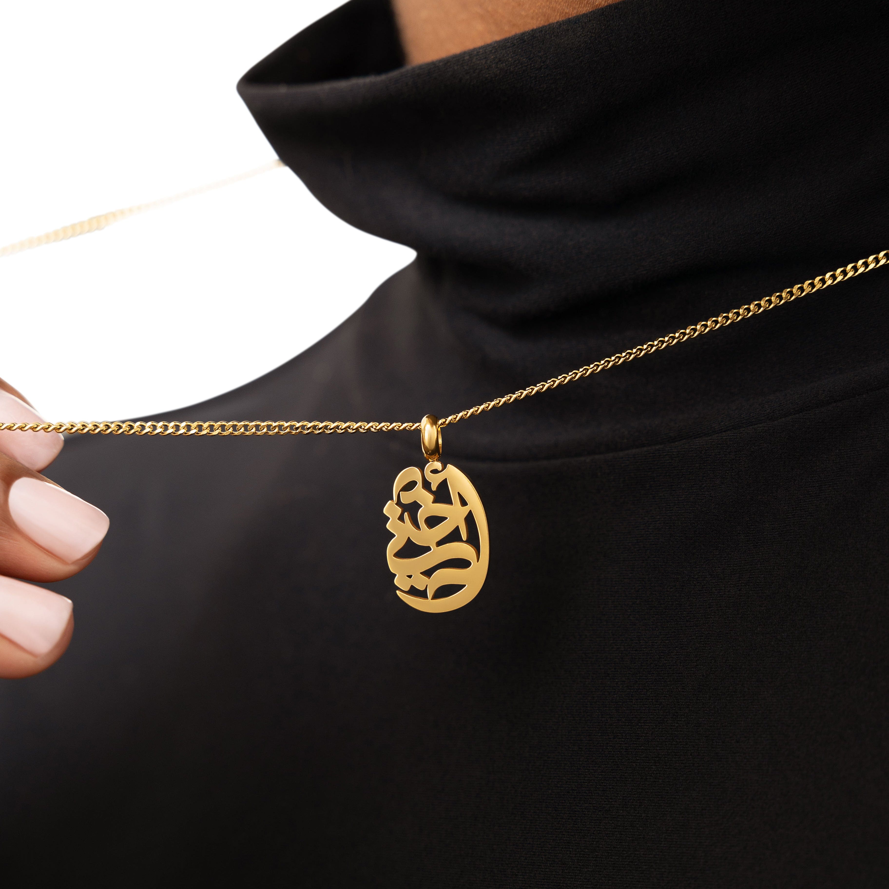Model wearing Sisterly Love Gold Pendant Necklace with a 22-inch chain, showcasing its elegance.