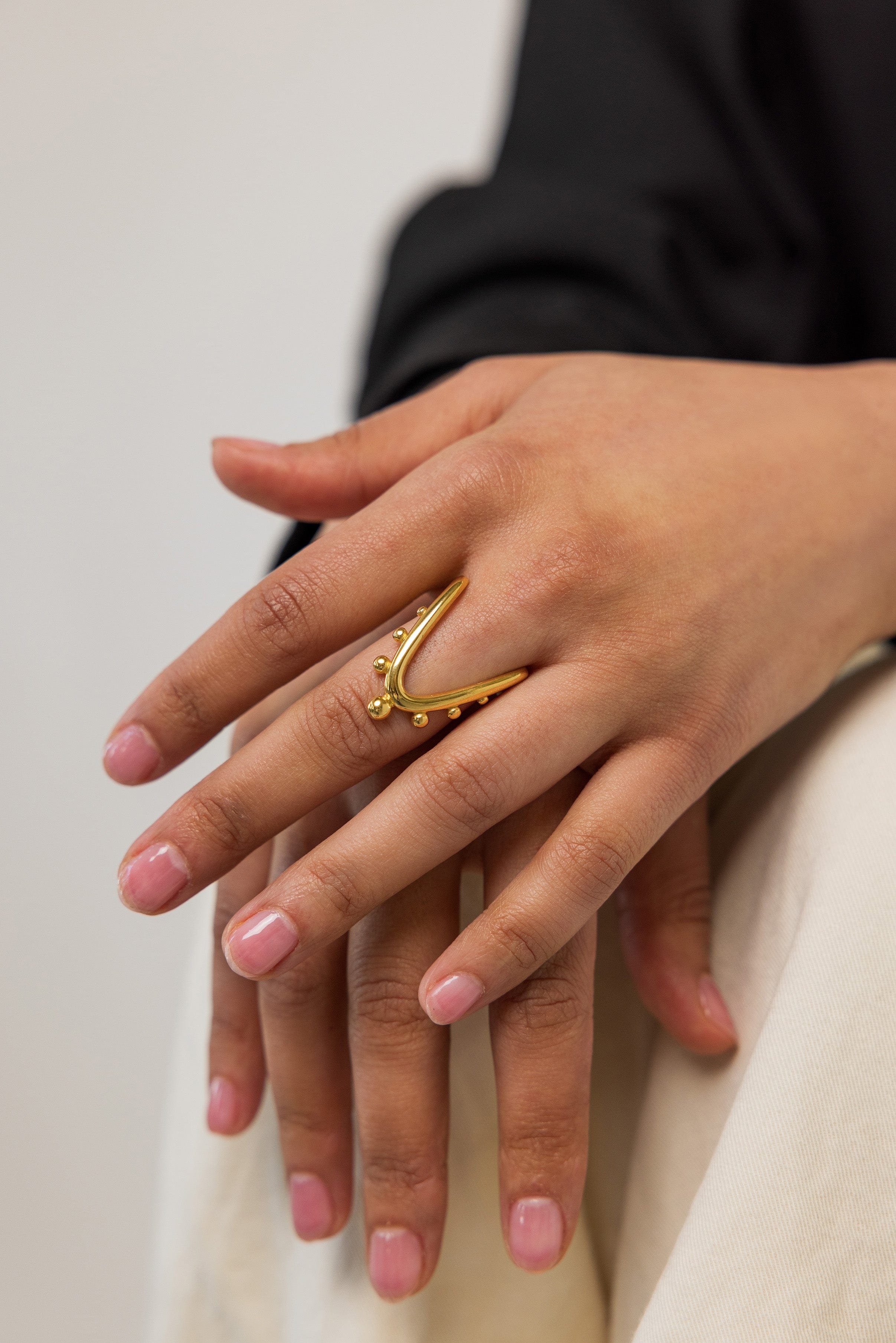 Side view of the Celestial Harmony Ring, displaying its elegant curvature.
