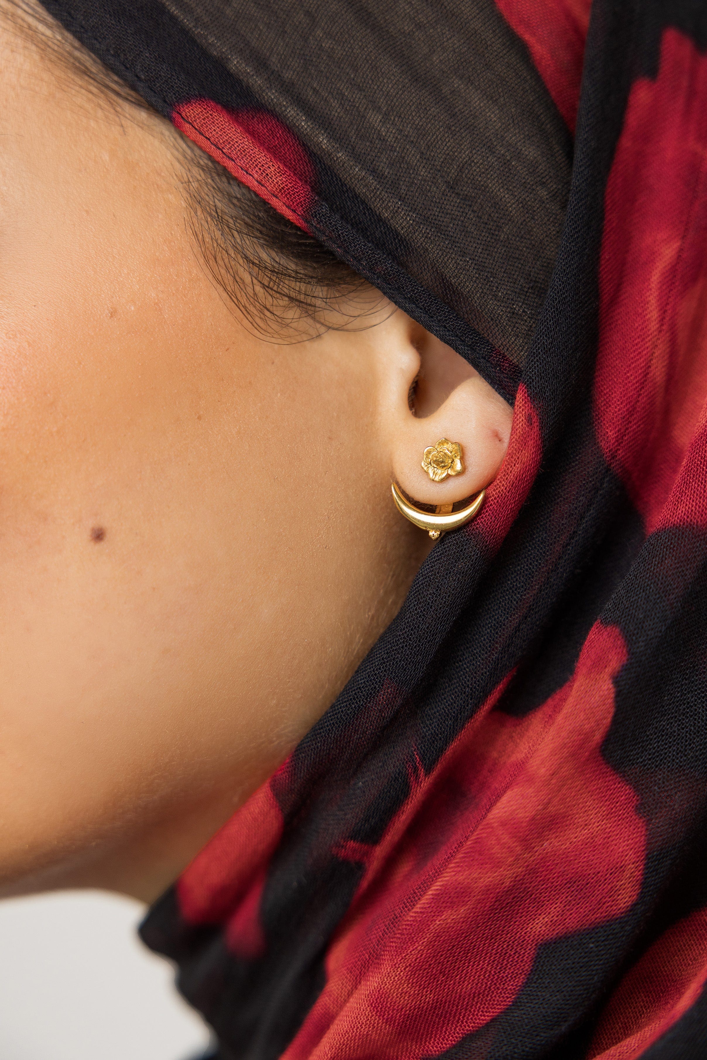 Close-up view of the Crescent Moon & Damask Rose Earrings, highlighting the craftsmanship and materials.