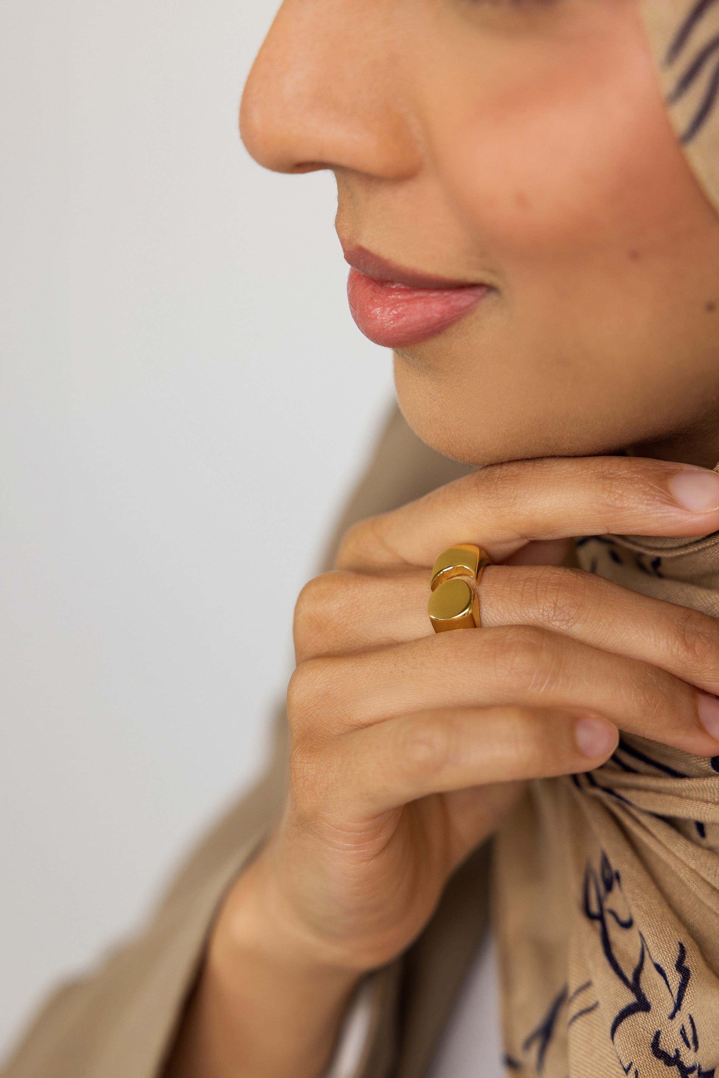 Front view of chunky gold ring showcasing bold moon-inspired split design