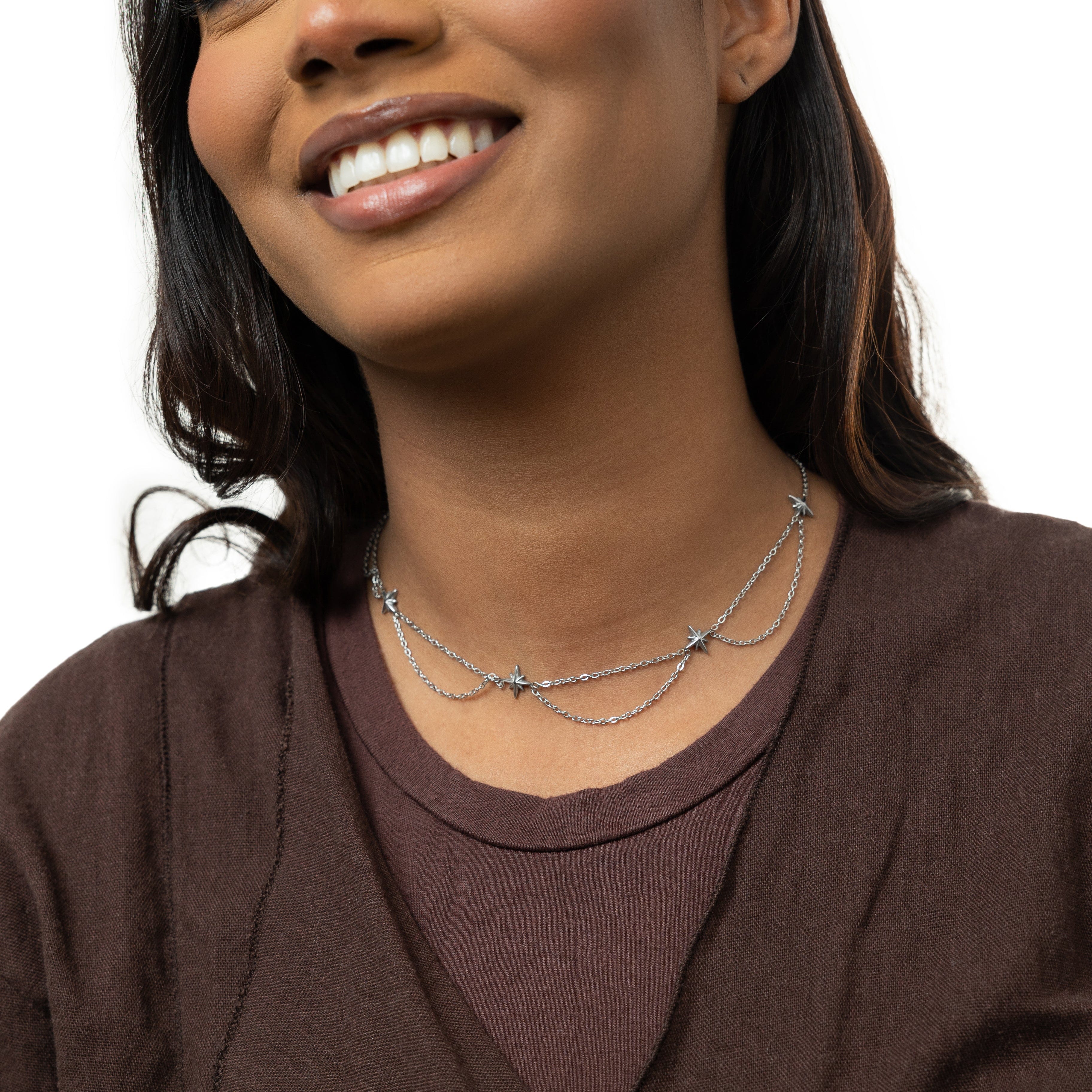 North Star choker necklace displayed in a velvet pouch, perfect for gifting.