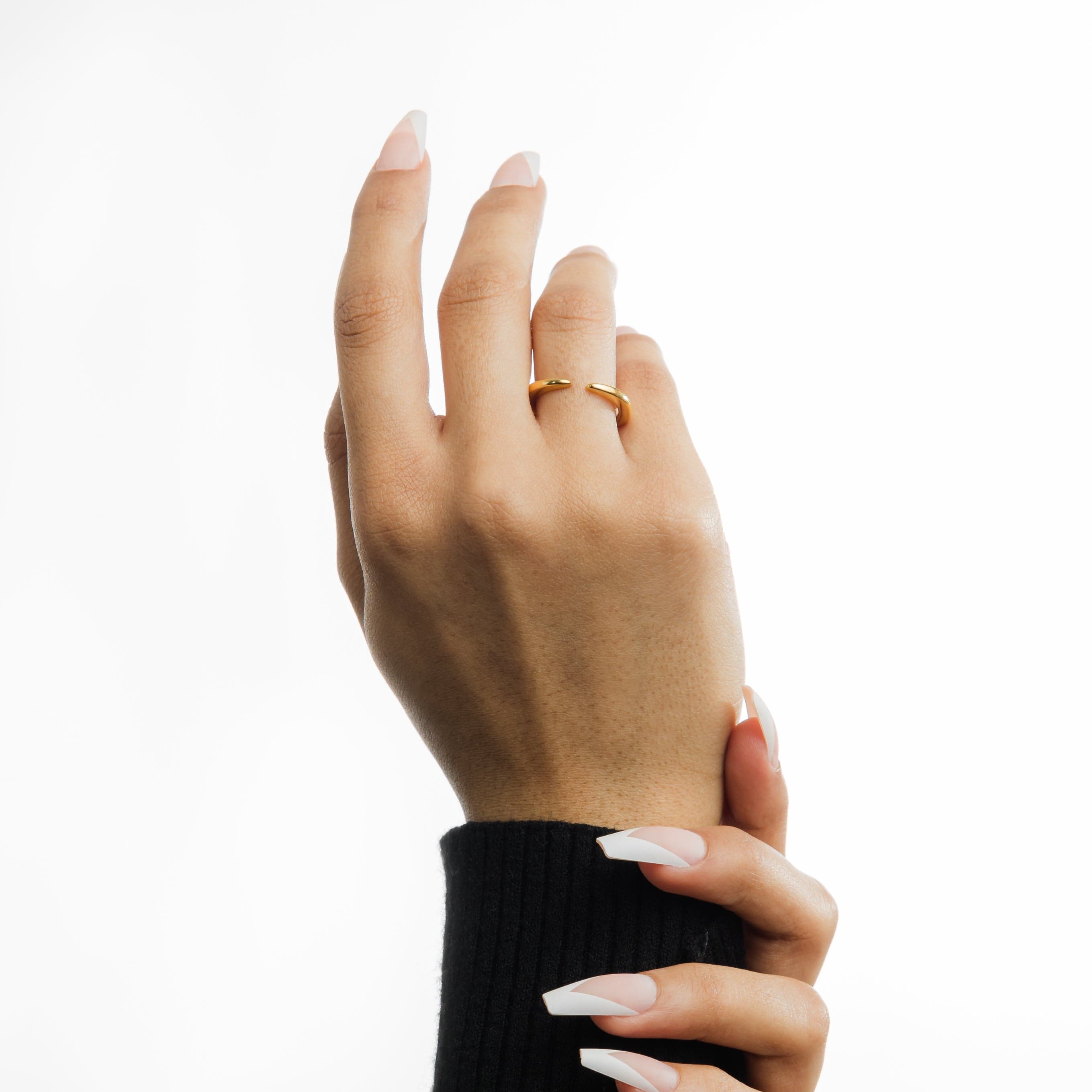 Close-up of Radiant Open Gap Gold Ring highlighting its shiny gold finish.