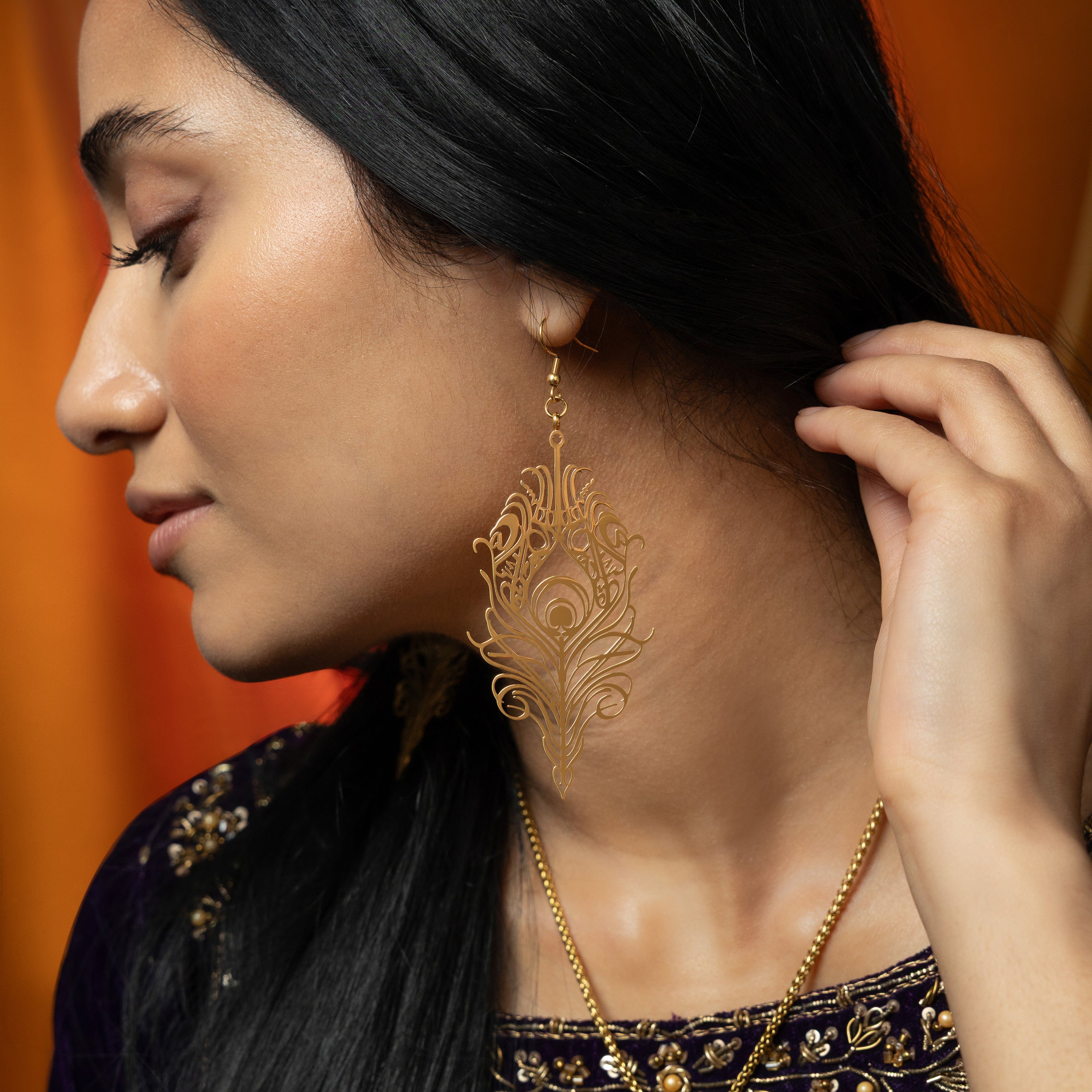 Close-up view of Eternal Bond Arabic calligraphy earrings showcasing intricate design and craftsmanship.