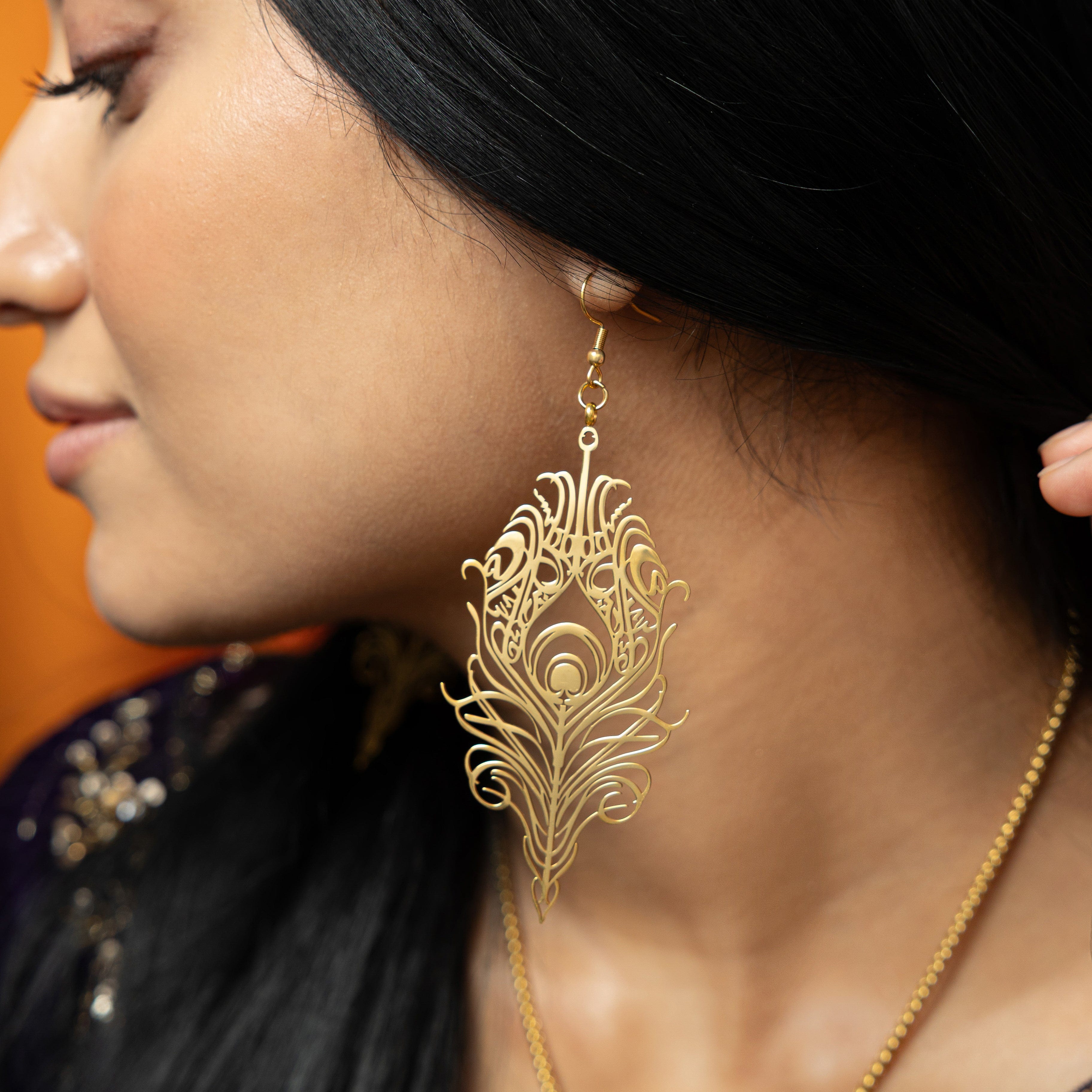 Eternal Bond earrings worn by a model, highlighting their elegant appeal and spiritual significance.