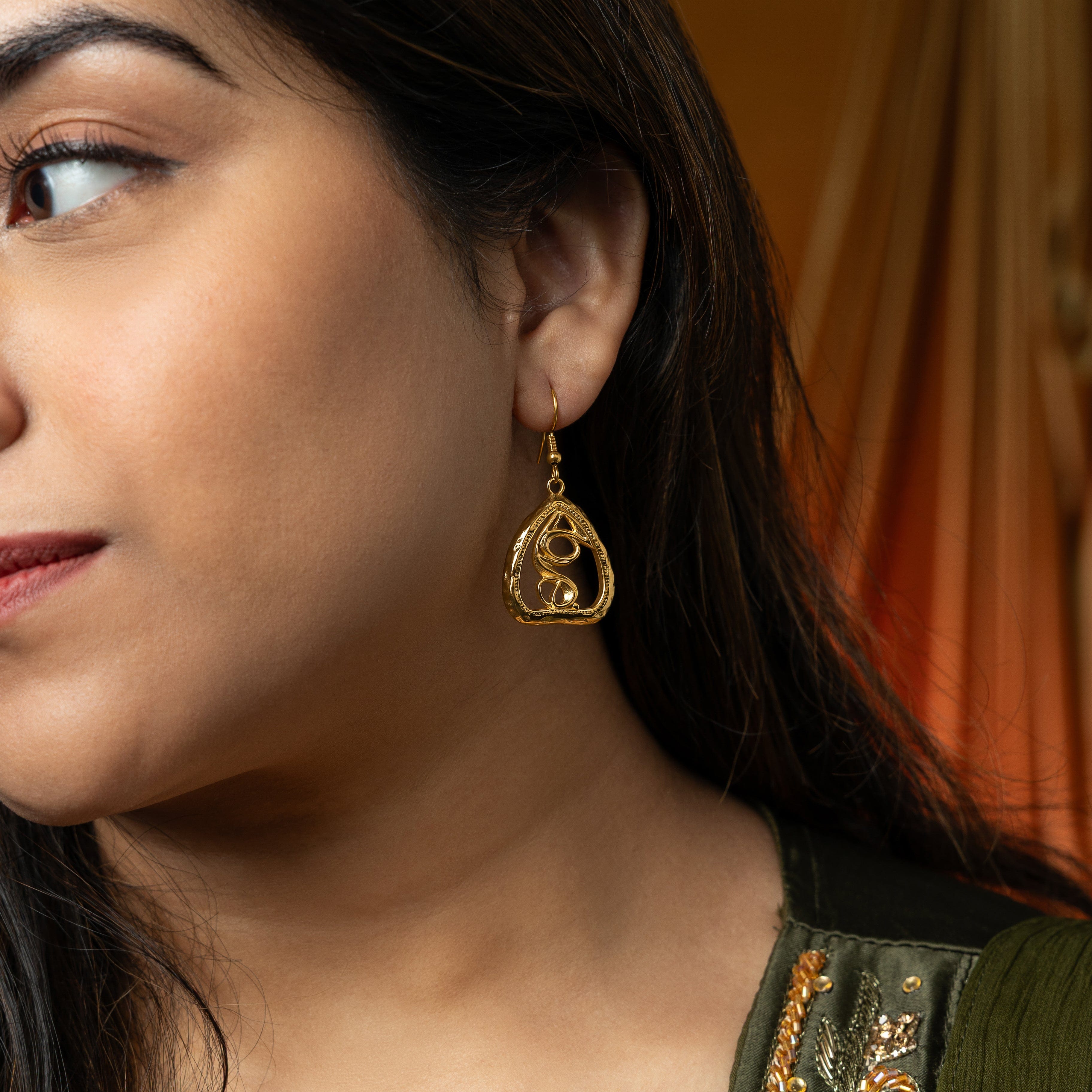 Packaging of the Heartfelt Earrings in a stylish Nominal Velvet Pouch, ideal for gifting.