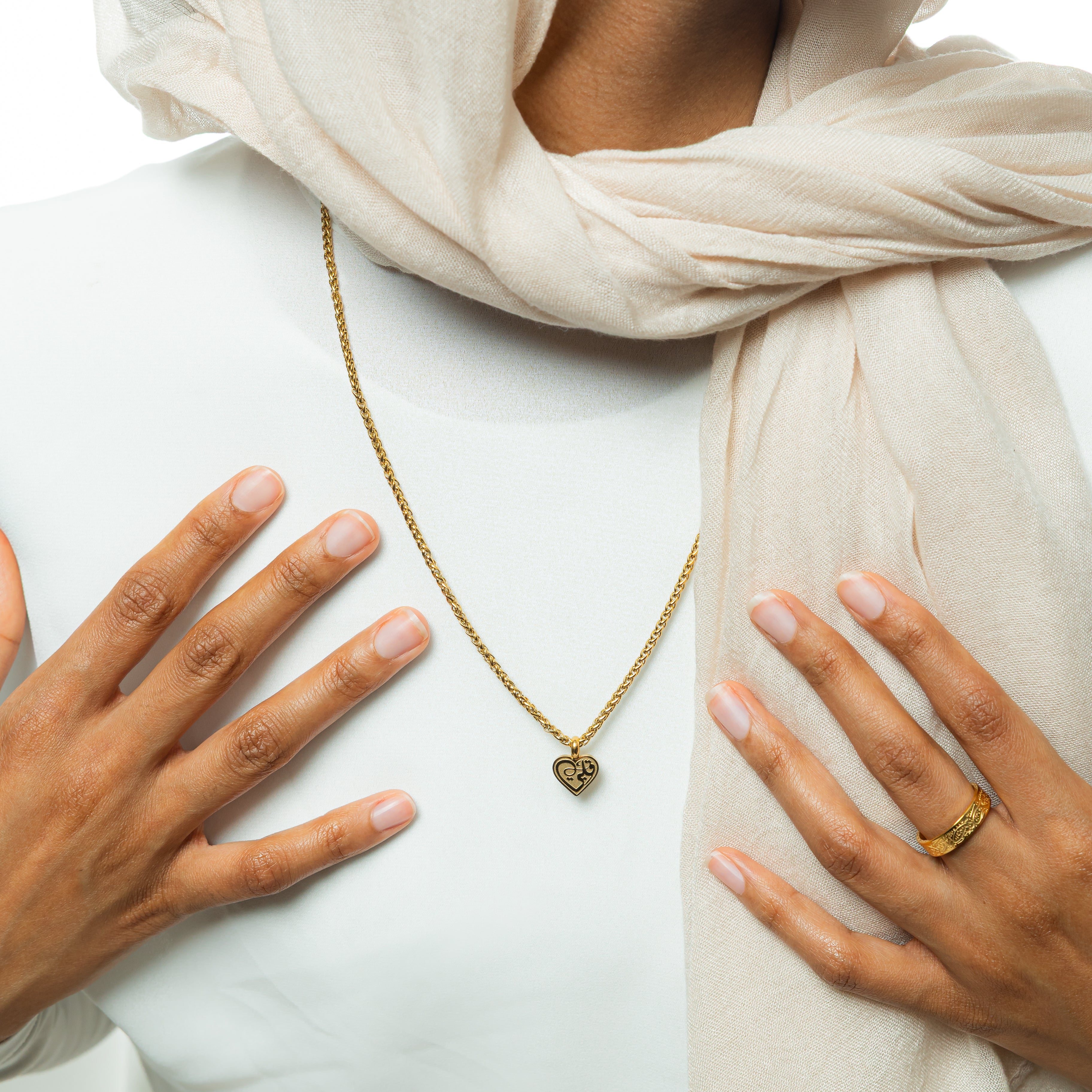 Elegant presentation of the affordable hypoallergenic necklaces in a velvet pouch.
