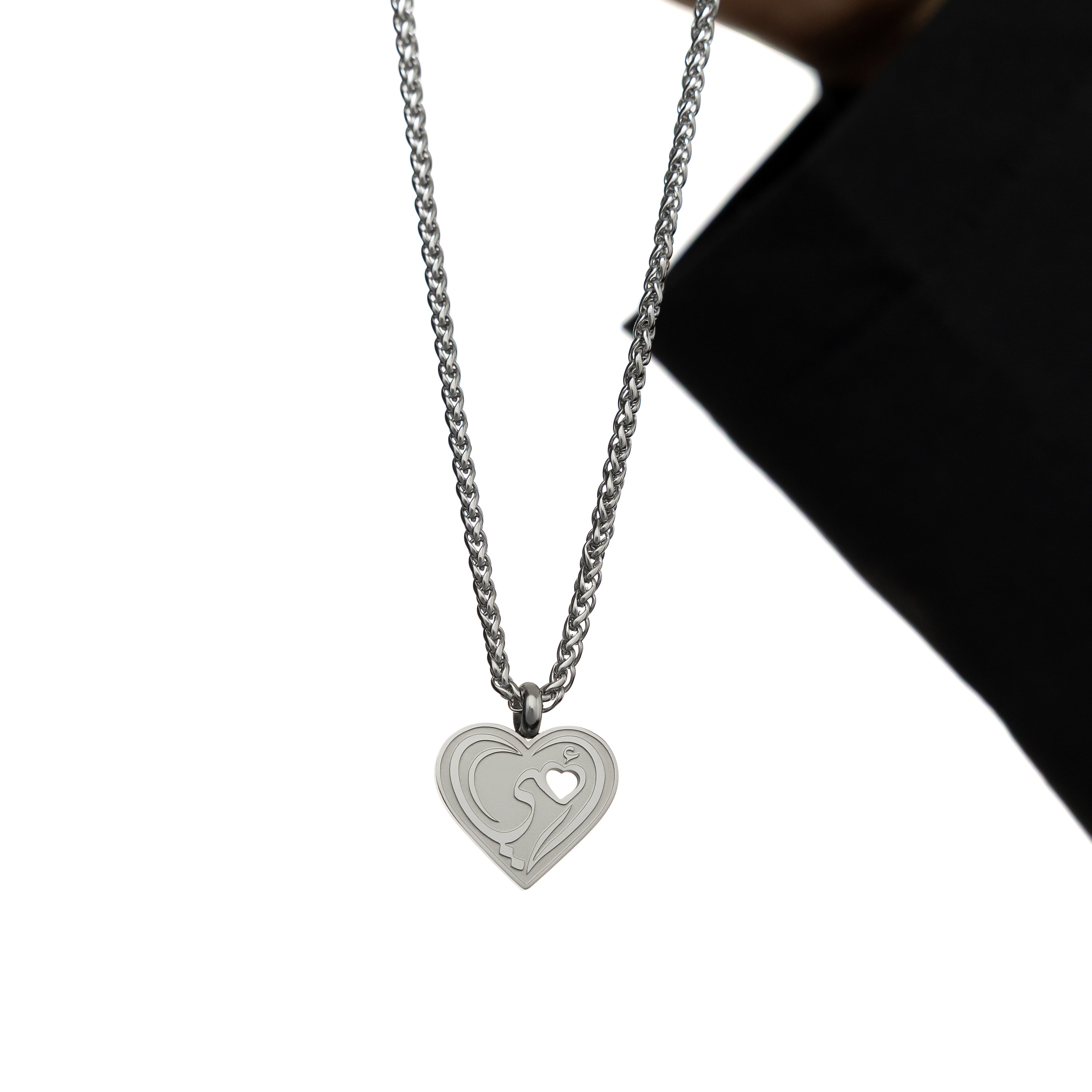 Heartfelt Mama Necklace worn by a daughter, symbolizing their special bond.