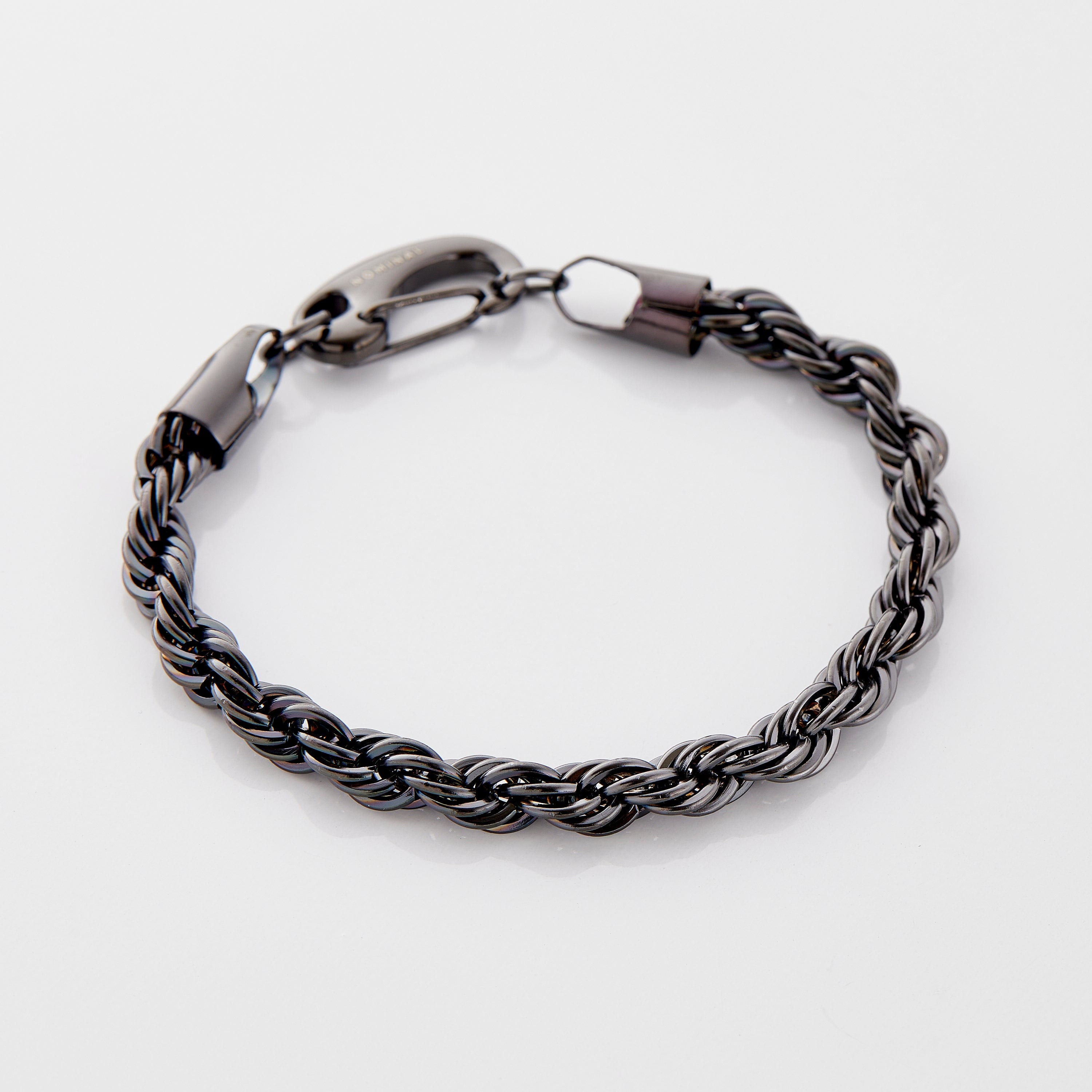 Elegant packaging of the mens rope chain bracelet in a velvet drawstring pouch.