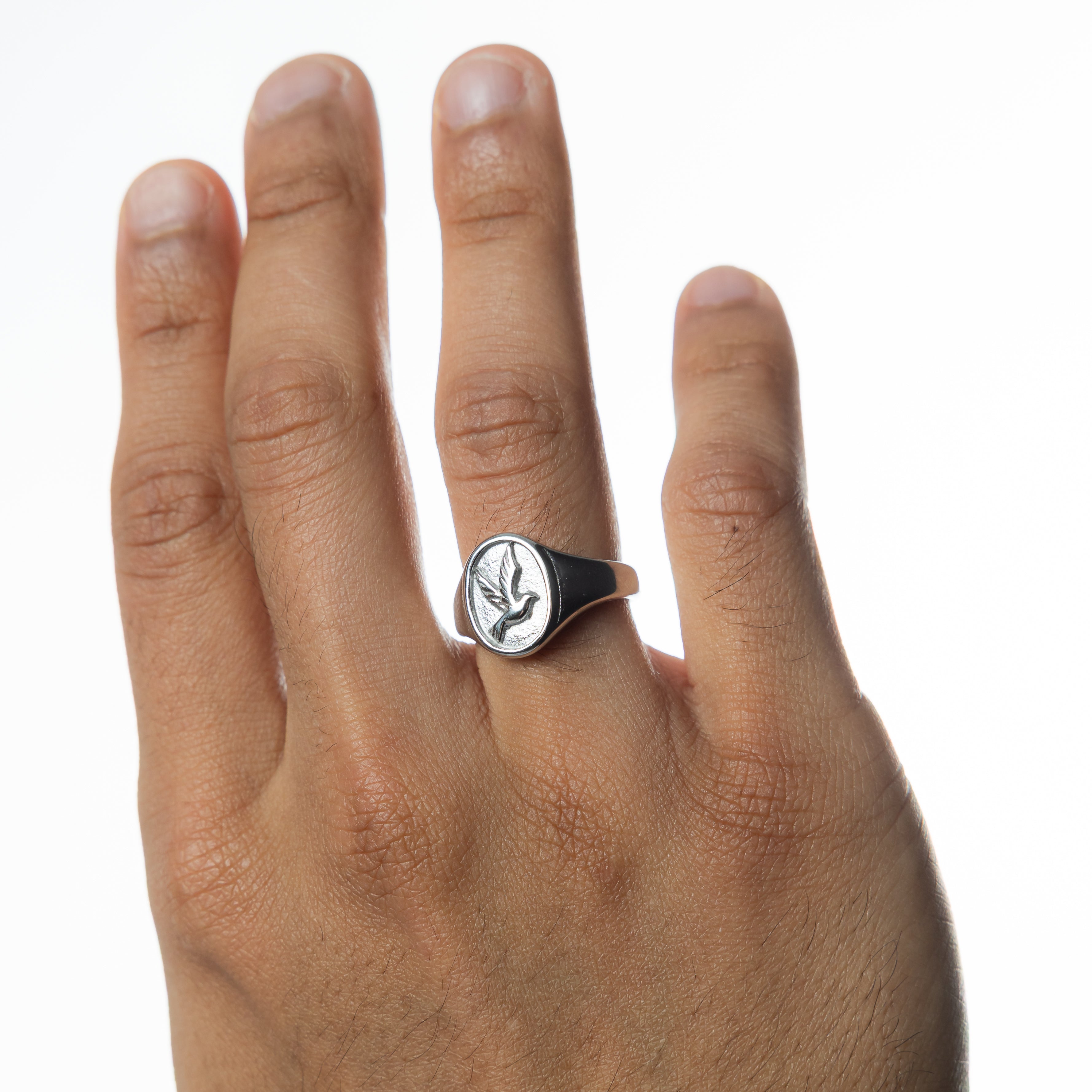 Tranquility ring on hand illustrating daily wear as symbolic jewelry for peace and hope