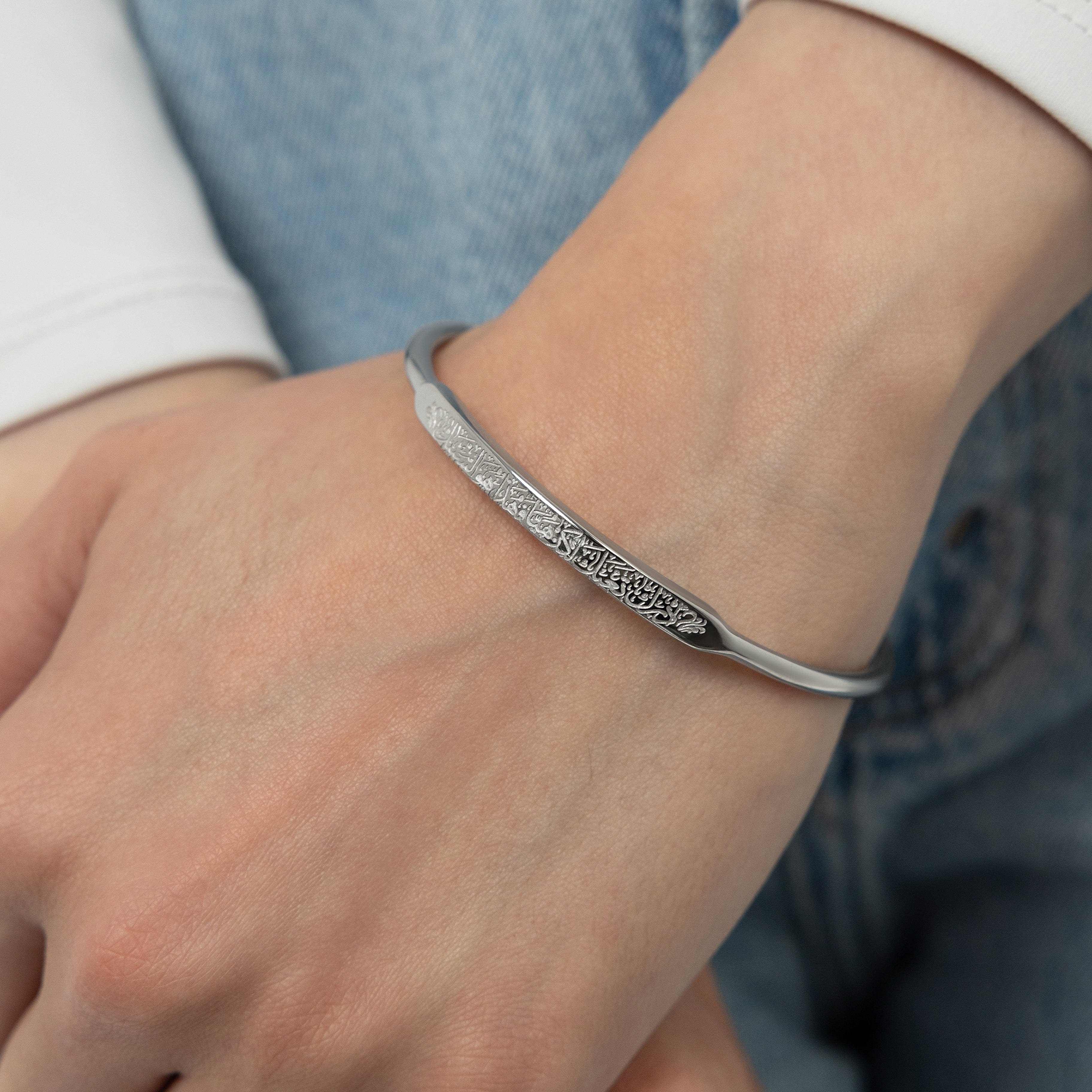 Close-up view of the Resilience Rumi Bracelet showcasing its elegant design and inspirational inscription.