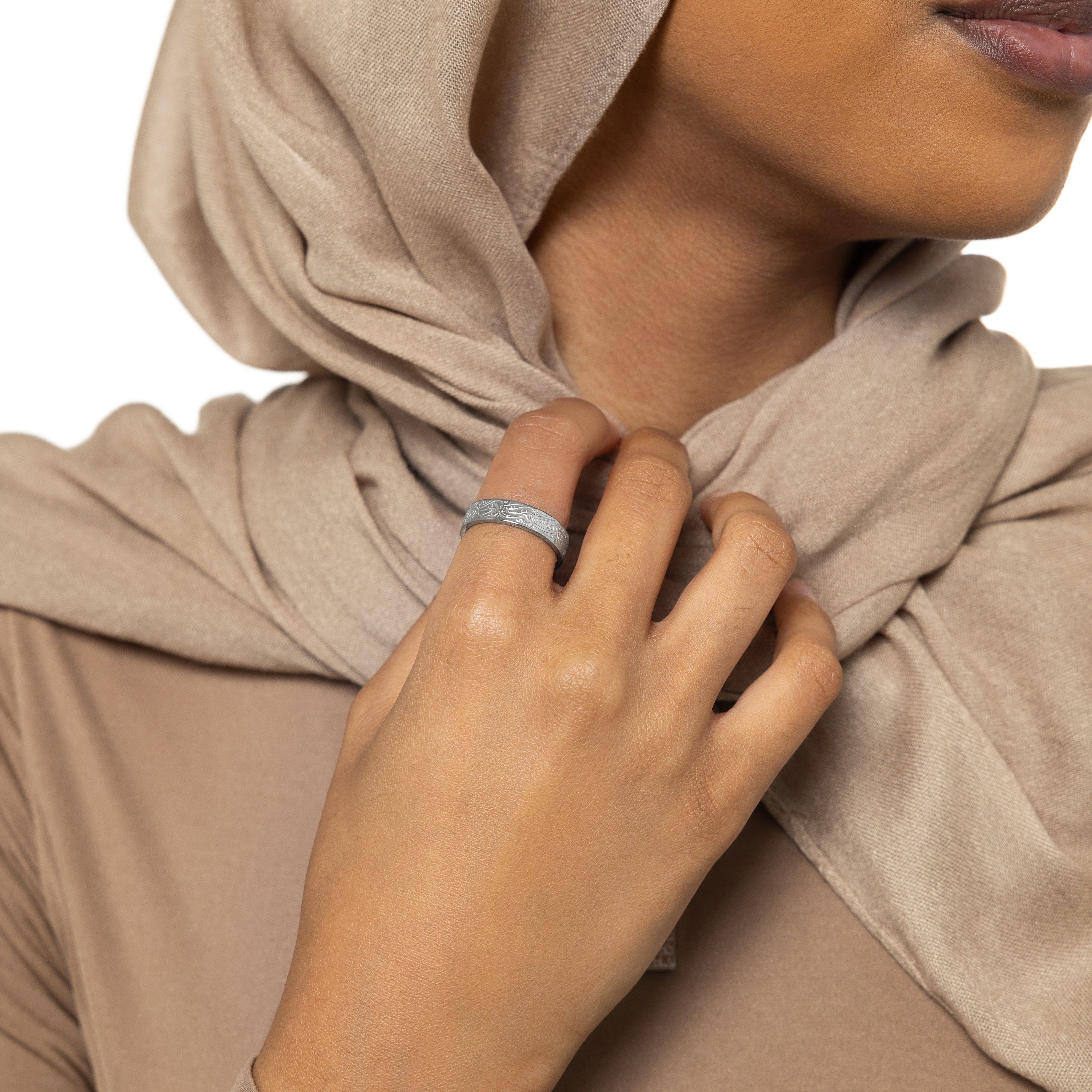 Lifestyle photo of the Rumi quote ring being worn with casual daily wear, highlighting its versatility.