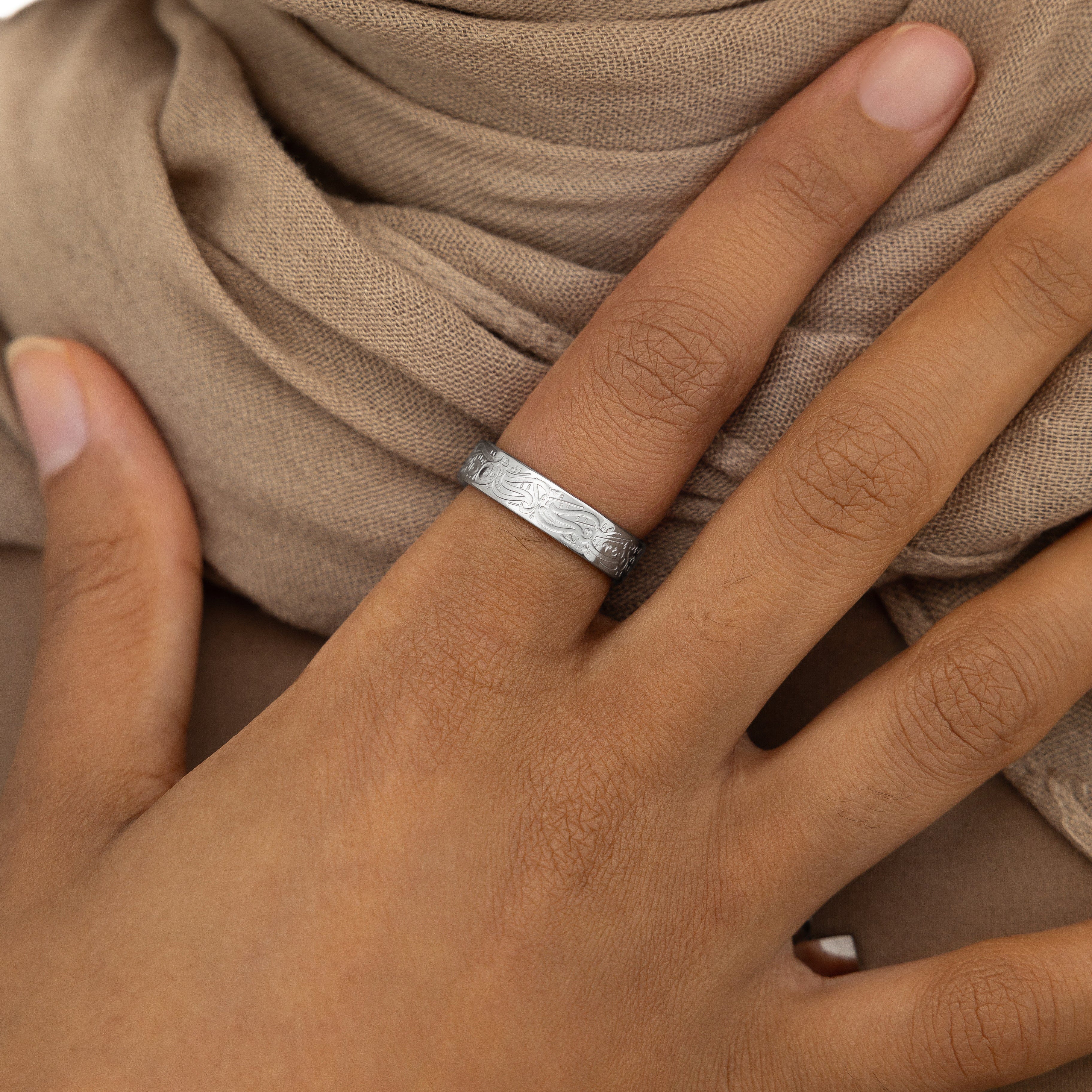 Product shot of the gold plated ring in its velvet pouch, ready as a motivational jewelry gift for her.