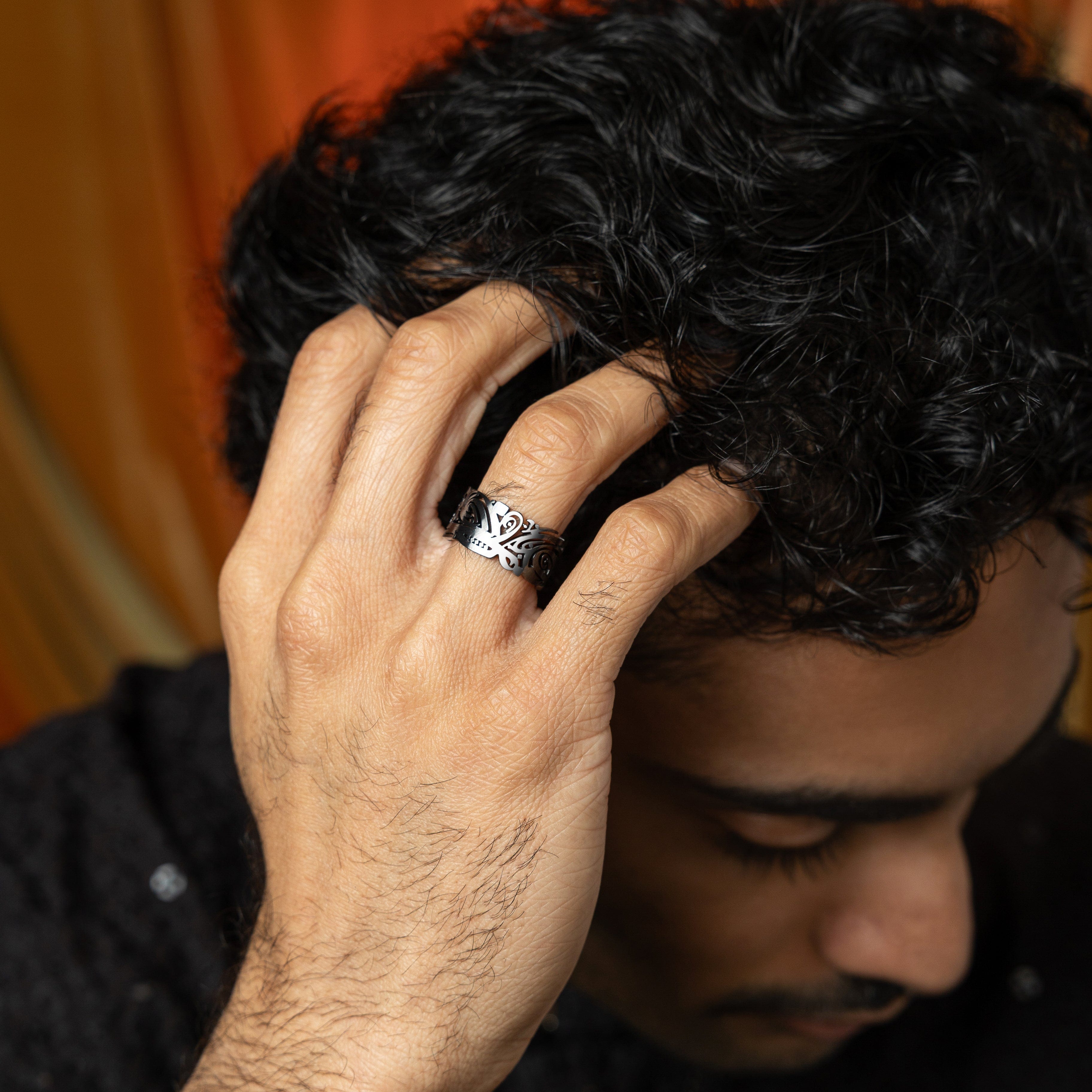 EASE ring worn on hand, illustrating the comfort and style suitable for everyday wear.