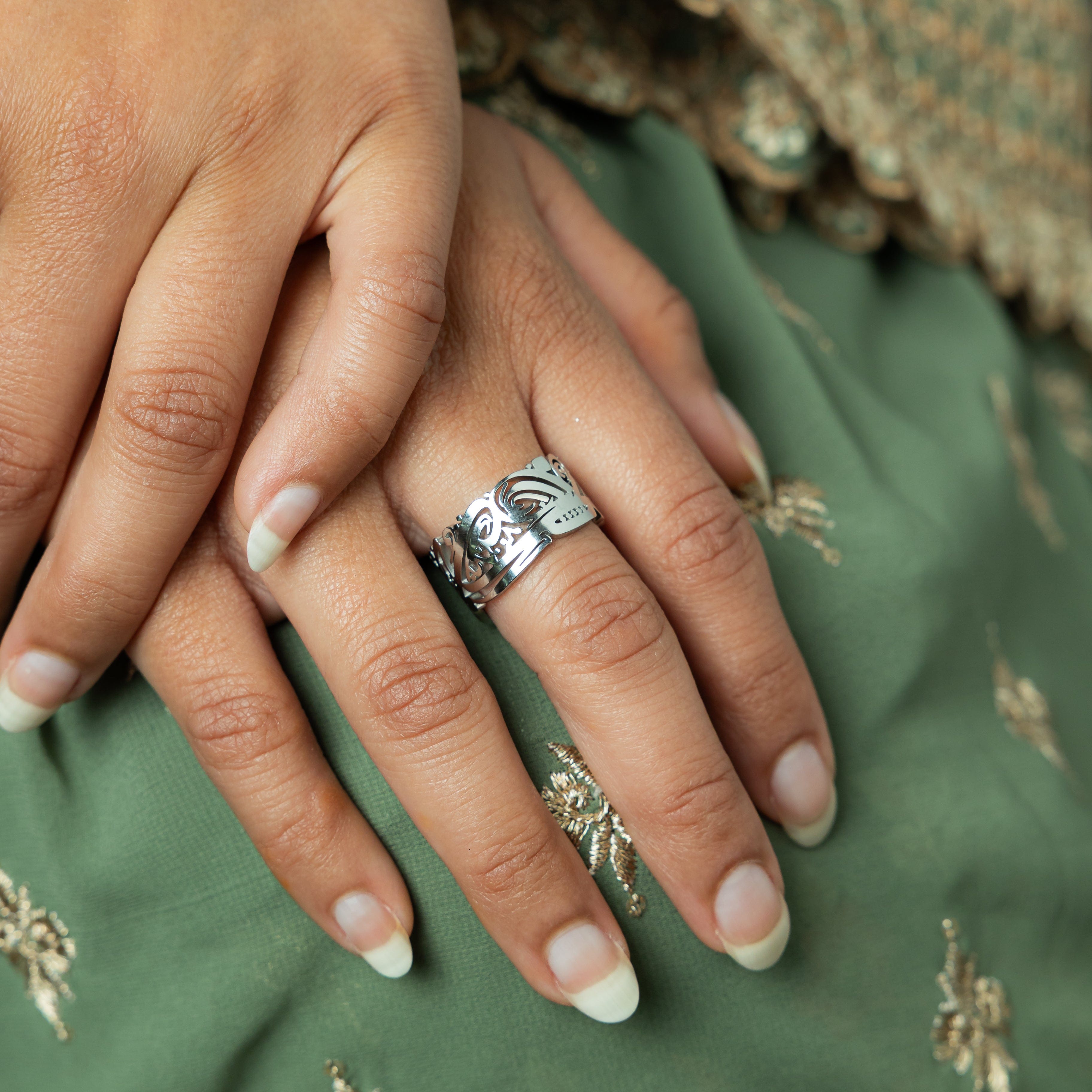 Side view of the EASE ring, showcasing its 10MM band width and gold plated finish.