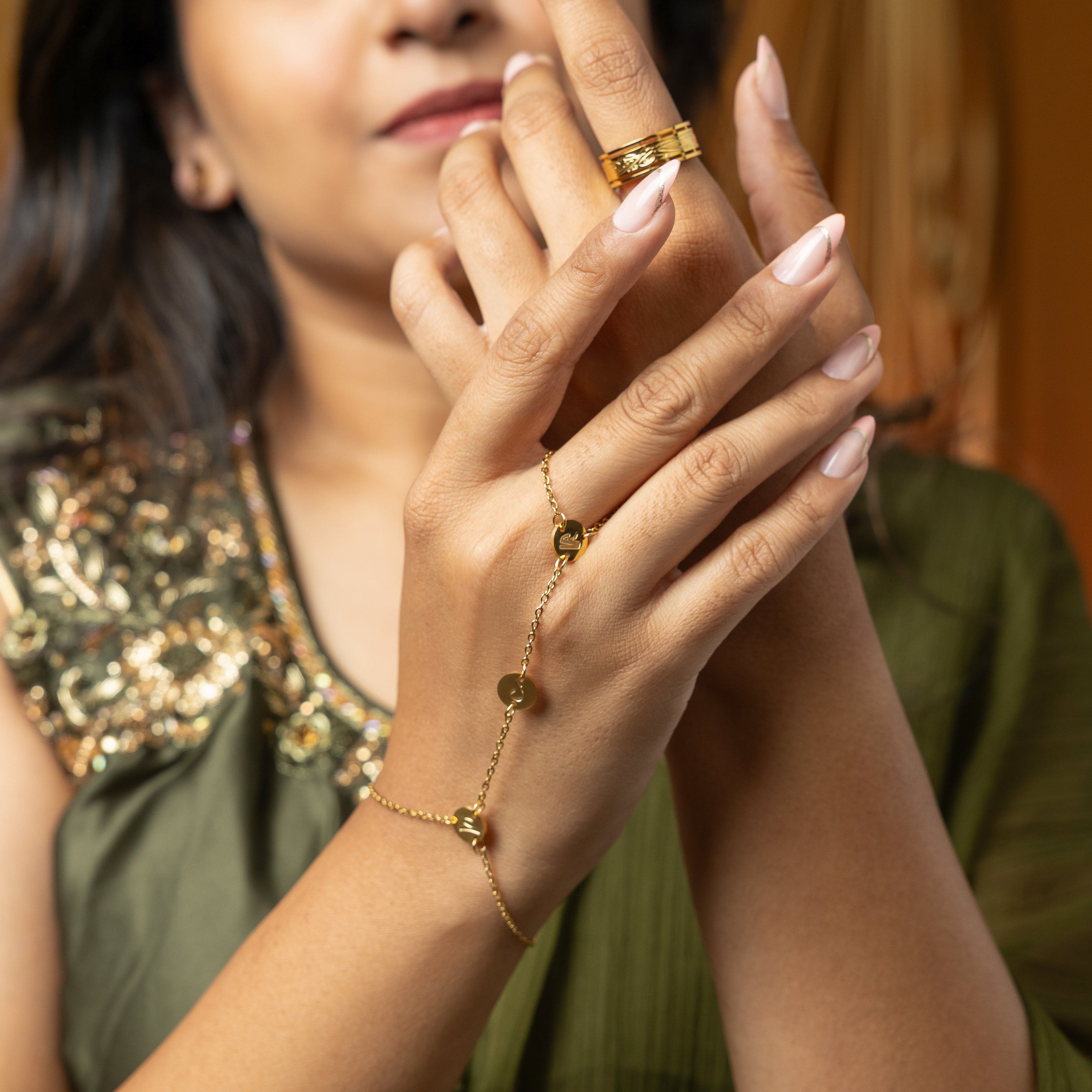 SALAAM hand chain viewed from the side, highlighting its elegant design and charm