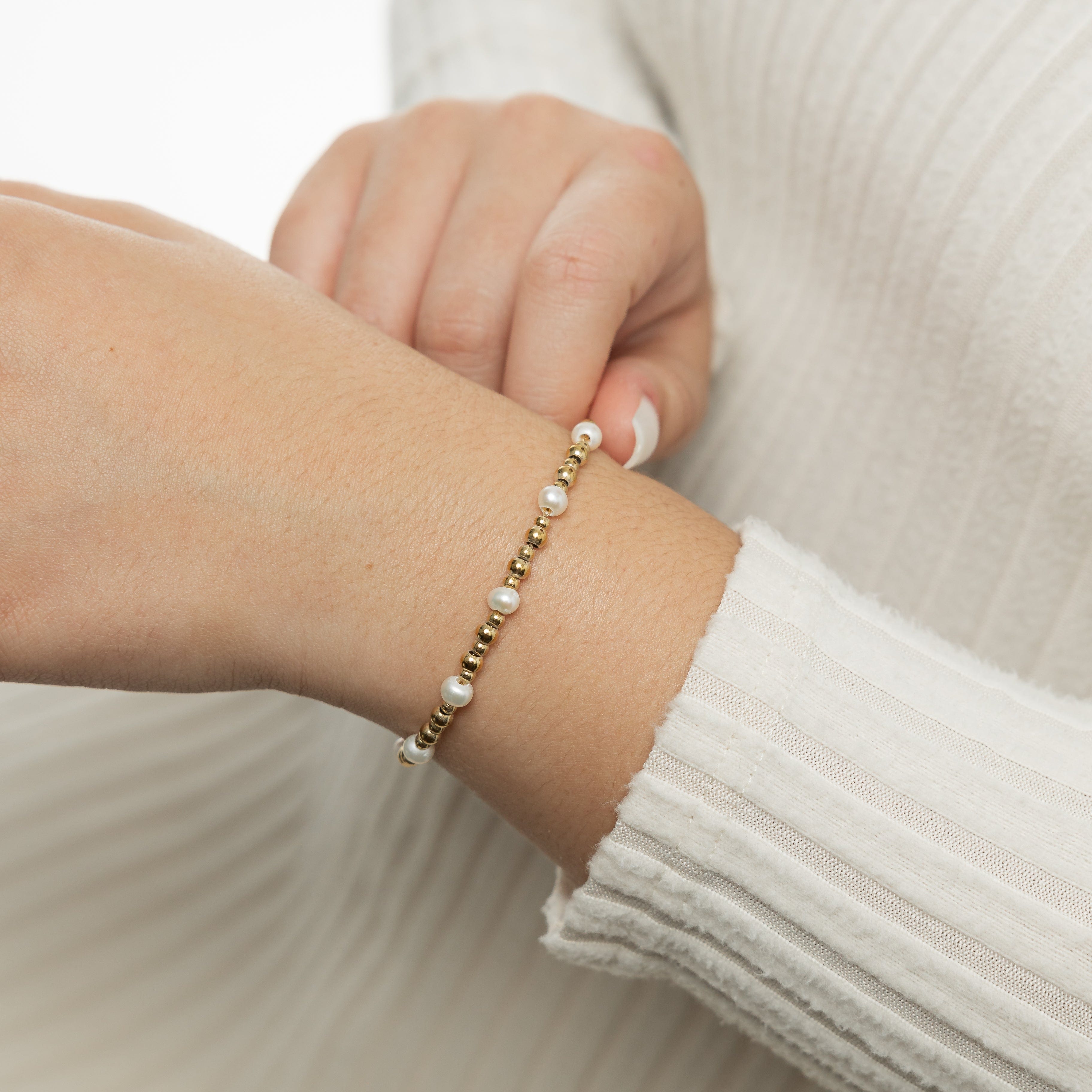 Close-up of the waterproof pearl bracelet highlighting its intricate design and hypoallergenic materials suitable for sensitive skin.