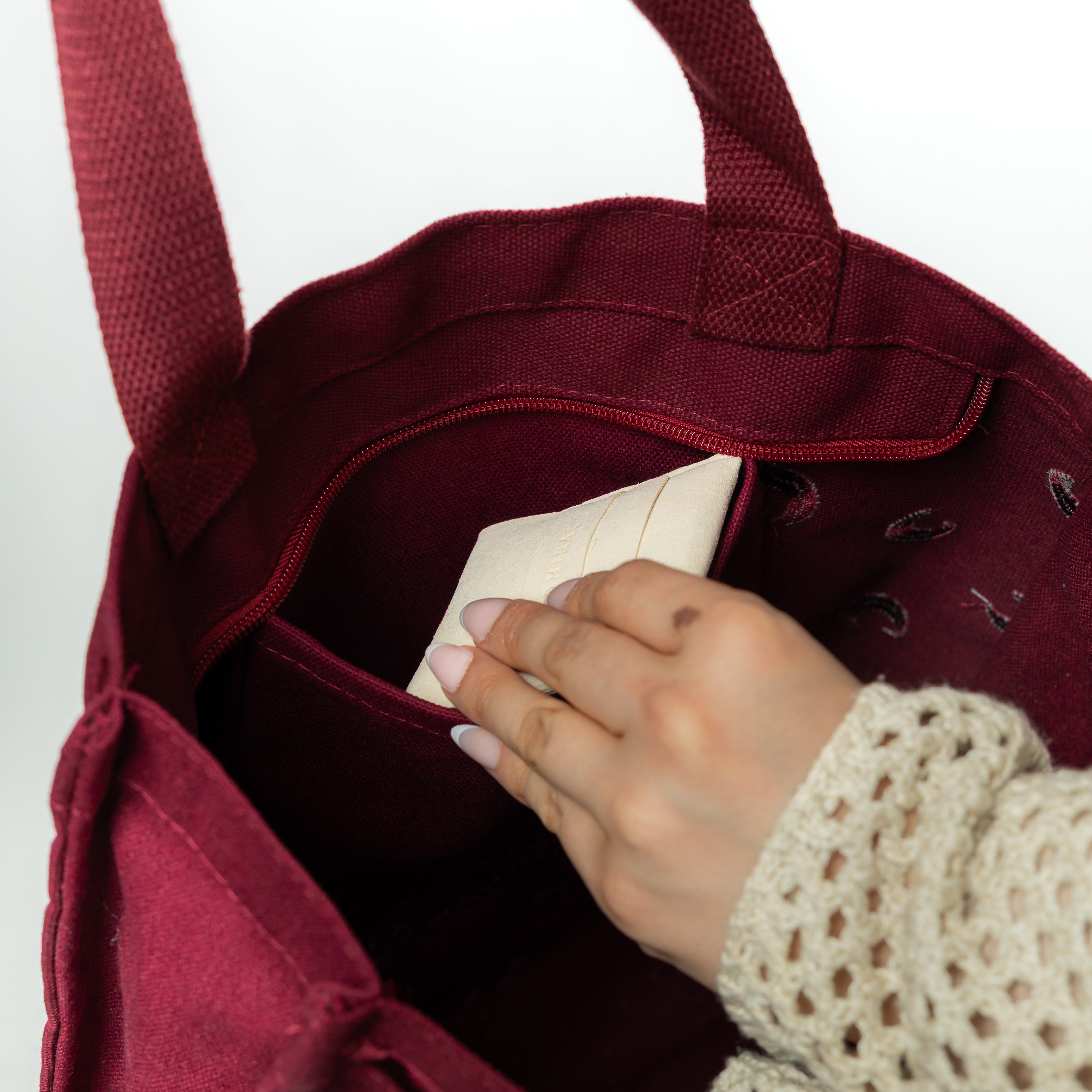 Open interior of the Celestial Charm tote bag, highlighting the spacious design and zip closure.