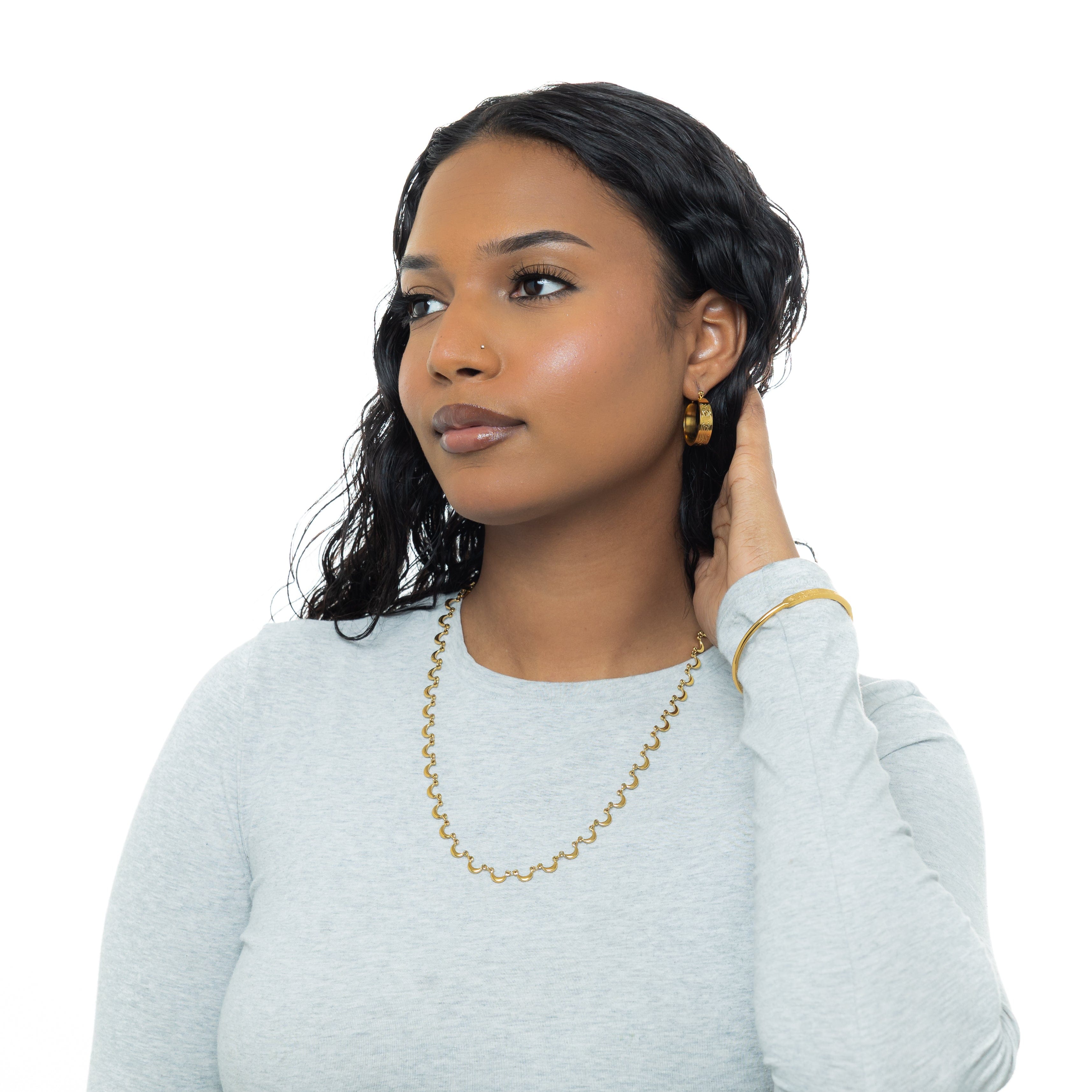 Celestial Elegance Necklace on a model, showcasing its layered look.