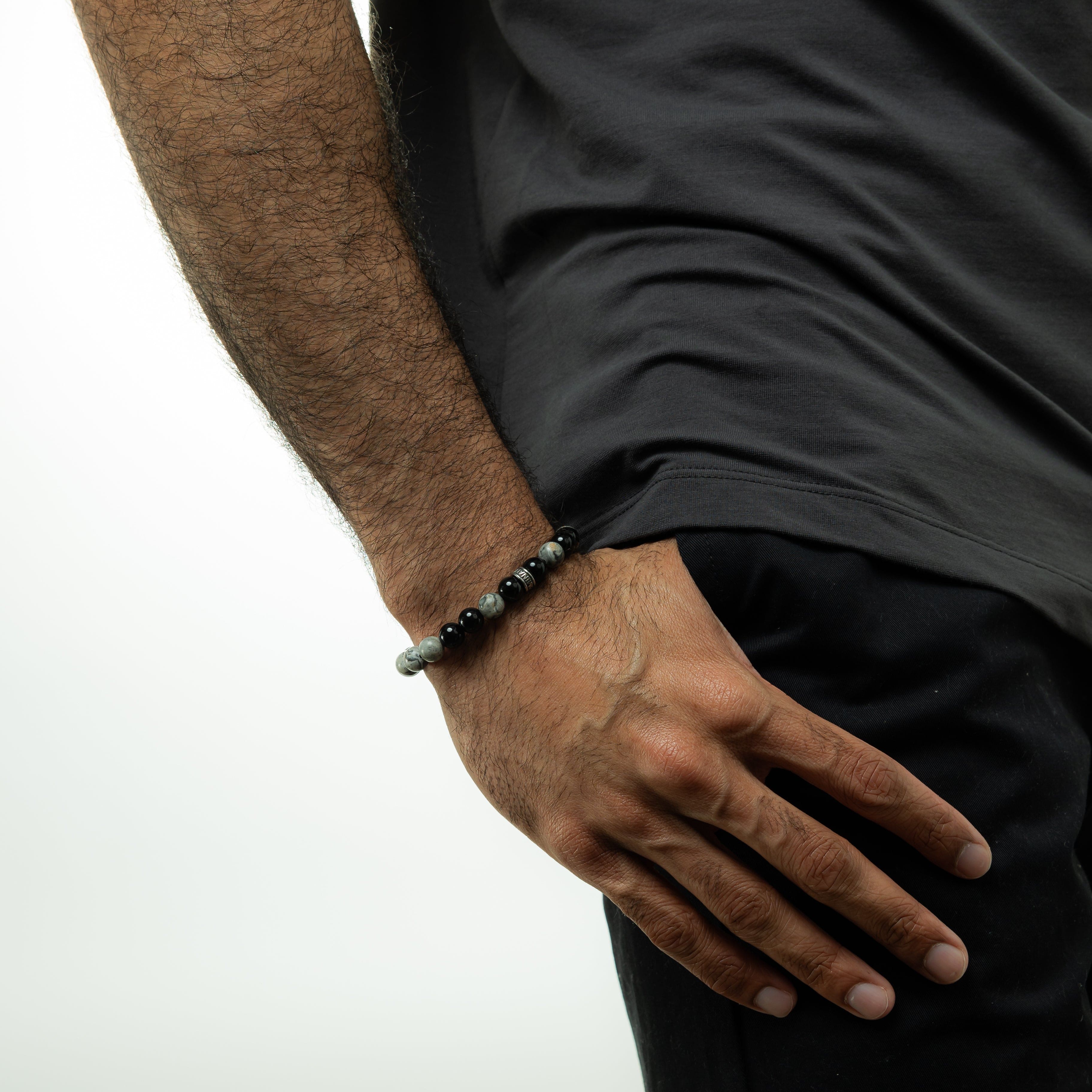 Close-up of the Kosmos Storm natural stone bracelet highlighting the unique bead colors and textures.