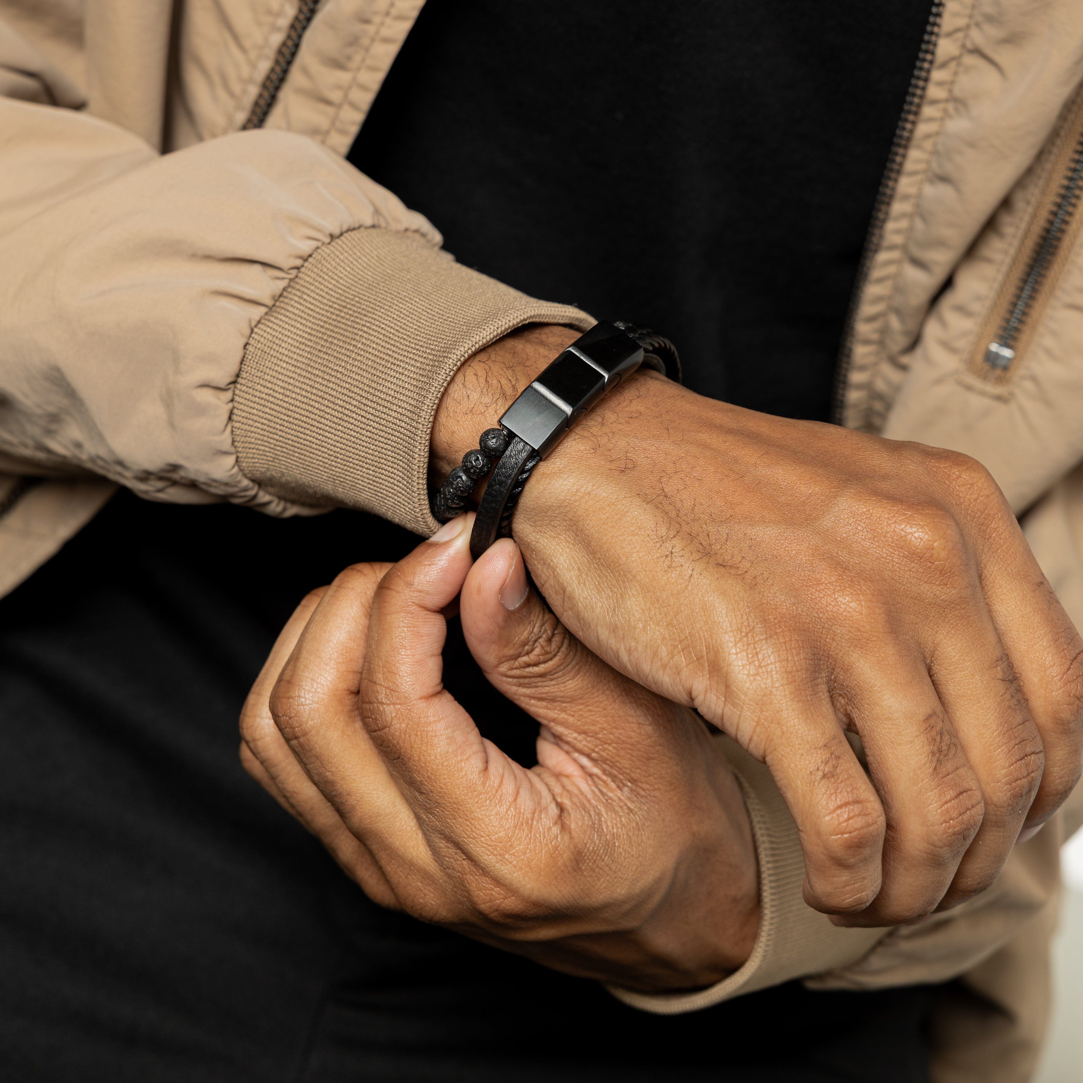 Trio Luxe Stackable Bracelet showcasing braided leather and lava stone details.