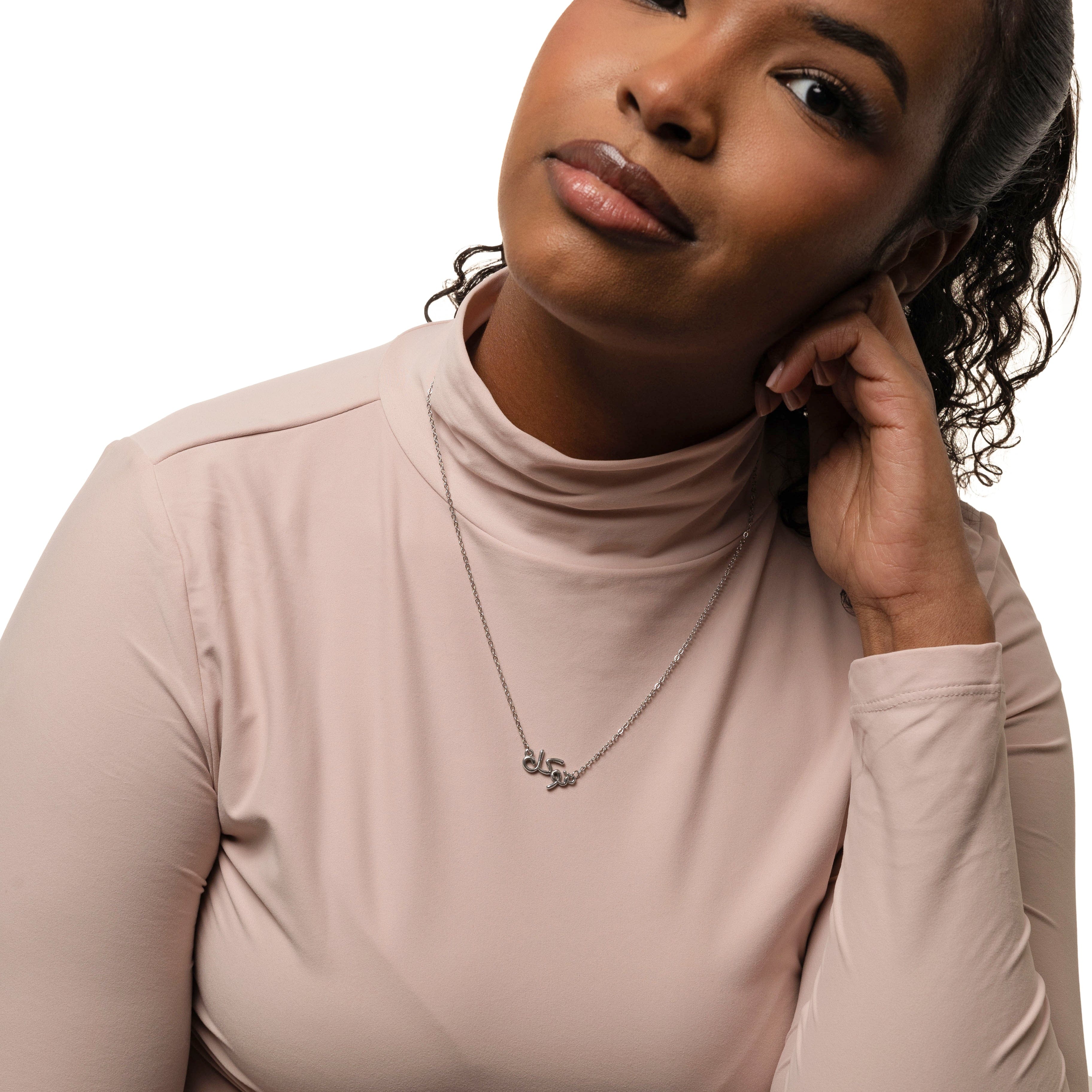 Detailed view of the bubble jewelry showcasing its gold plating and hypoallergenic features.