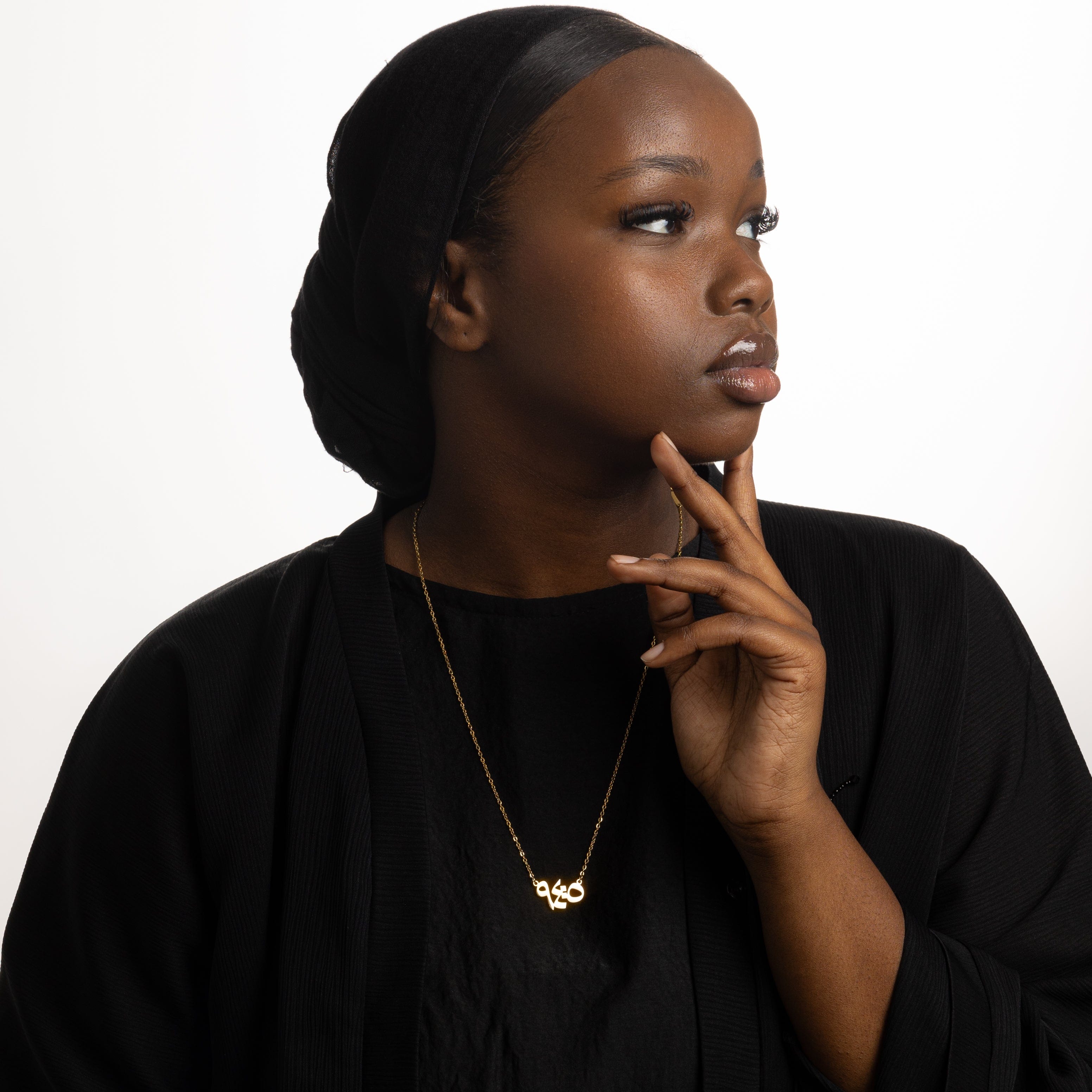 Model wearing the Embrace Serenity verse necklace, highlighting its elegance and inspirational message