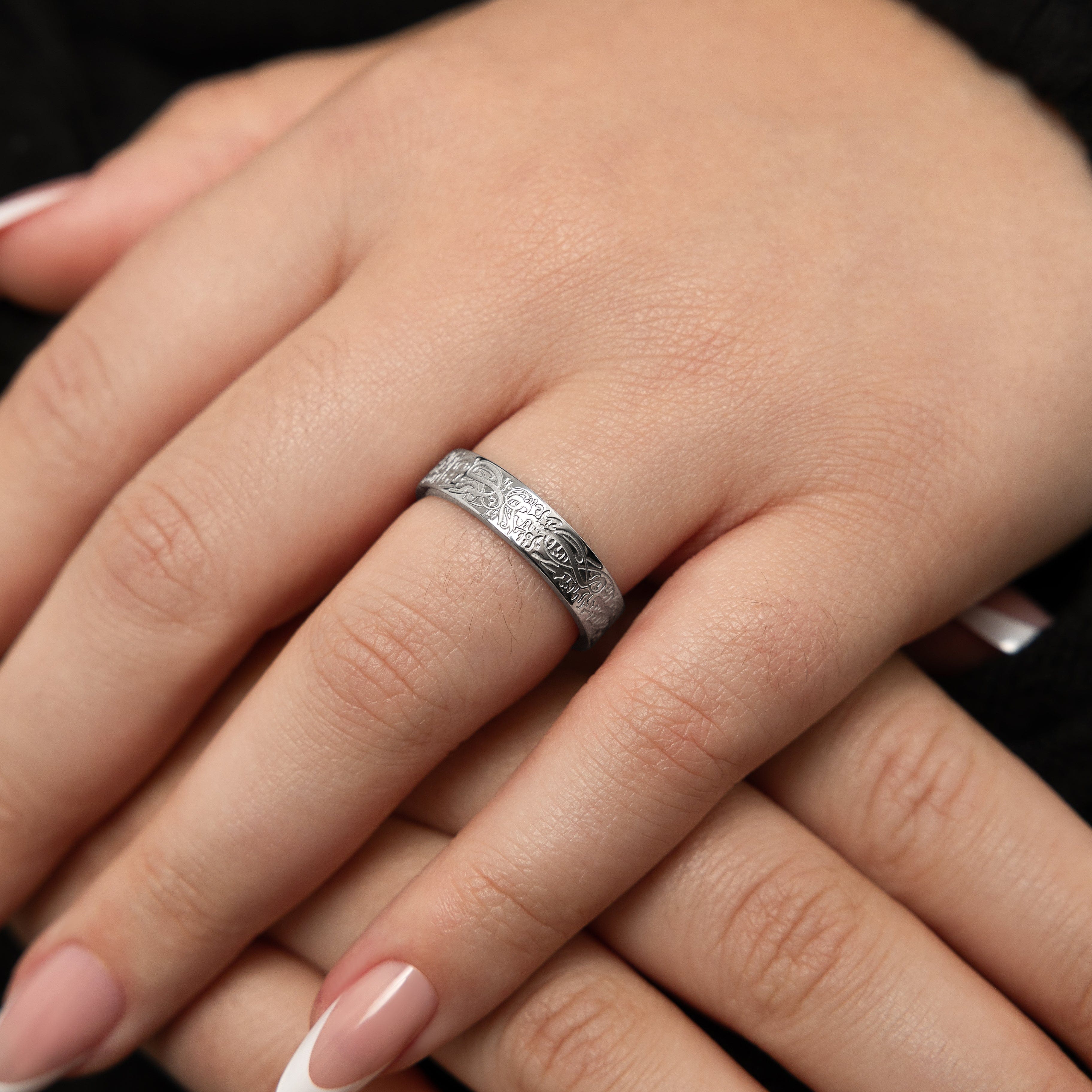 Elegant presentation of the gold ring in a velvet pouch, perfect for gifting.