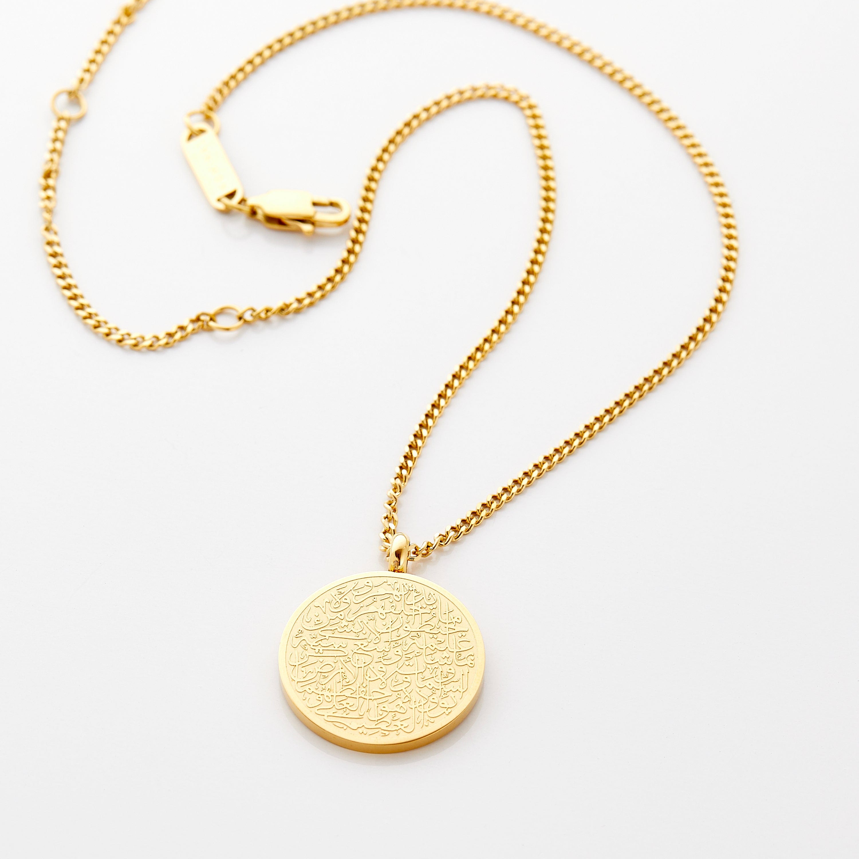Ayatul Kursi necklace for kids, showing the delicate gold-plated design and curb chain.